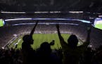 Eric Lusch, Jake Corrigan, Andrew Bourgoine celebrated Chelsea's second goal at U.S. Bank Stadium on Wednesday, August 3, 2016, in Minneapolis, Minn.]