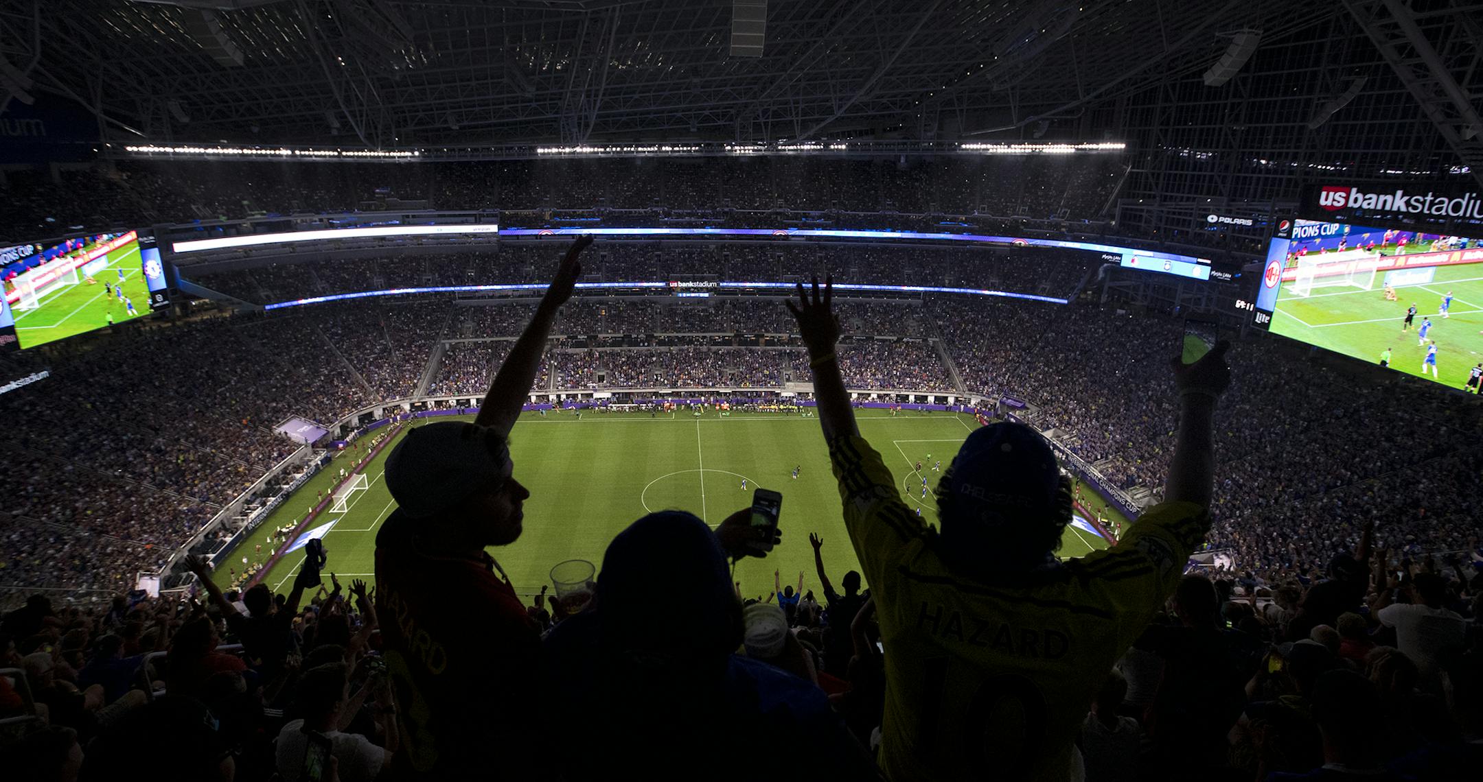 Eric Lusch, Jake Corrigan, Andrew Bourgoine celebrated Chelsea's second goal at U.S. Bank Stadium on Wednesday, August 3, 2016, in Minneapolis, Minn.] RENEE JONES SCHNEIDER • renee.jones@startribune.com First event at US Bank Stadium; Chelsea F.C. verses A.C. Milan ORG XMIT: MIN1608032235340021