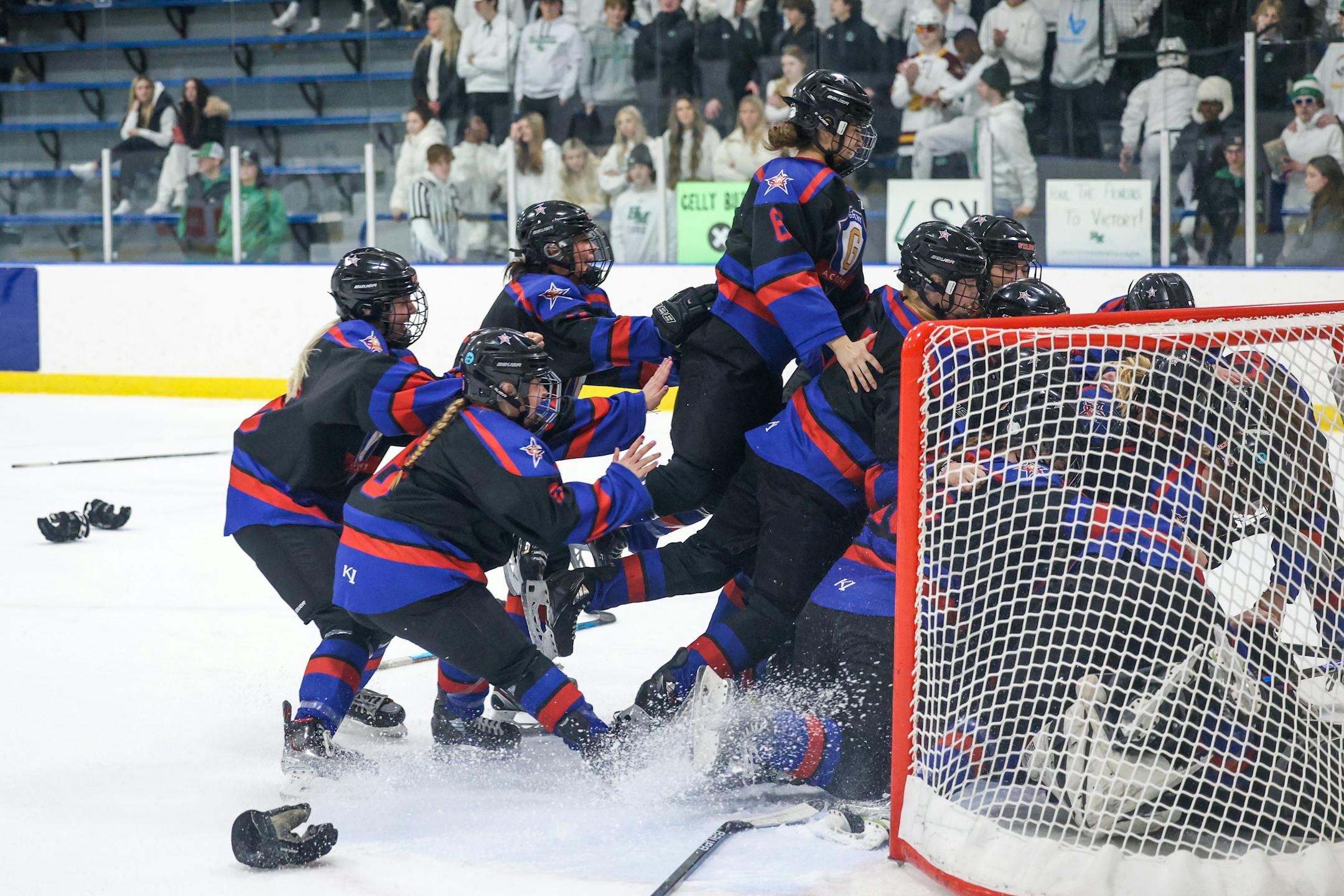 Gentry Academy celebrates their 4-1 win over Hill-Murray in the Class 2A, Section 4 final at Aldrich Ice Arena on Thursday night. Photo by Cheryl A. Myers, SportsEngine
