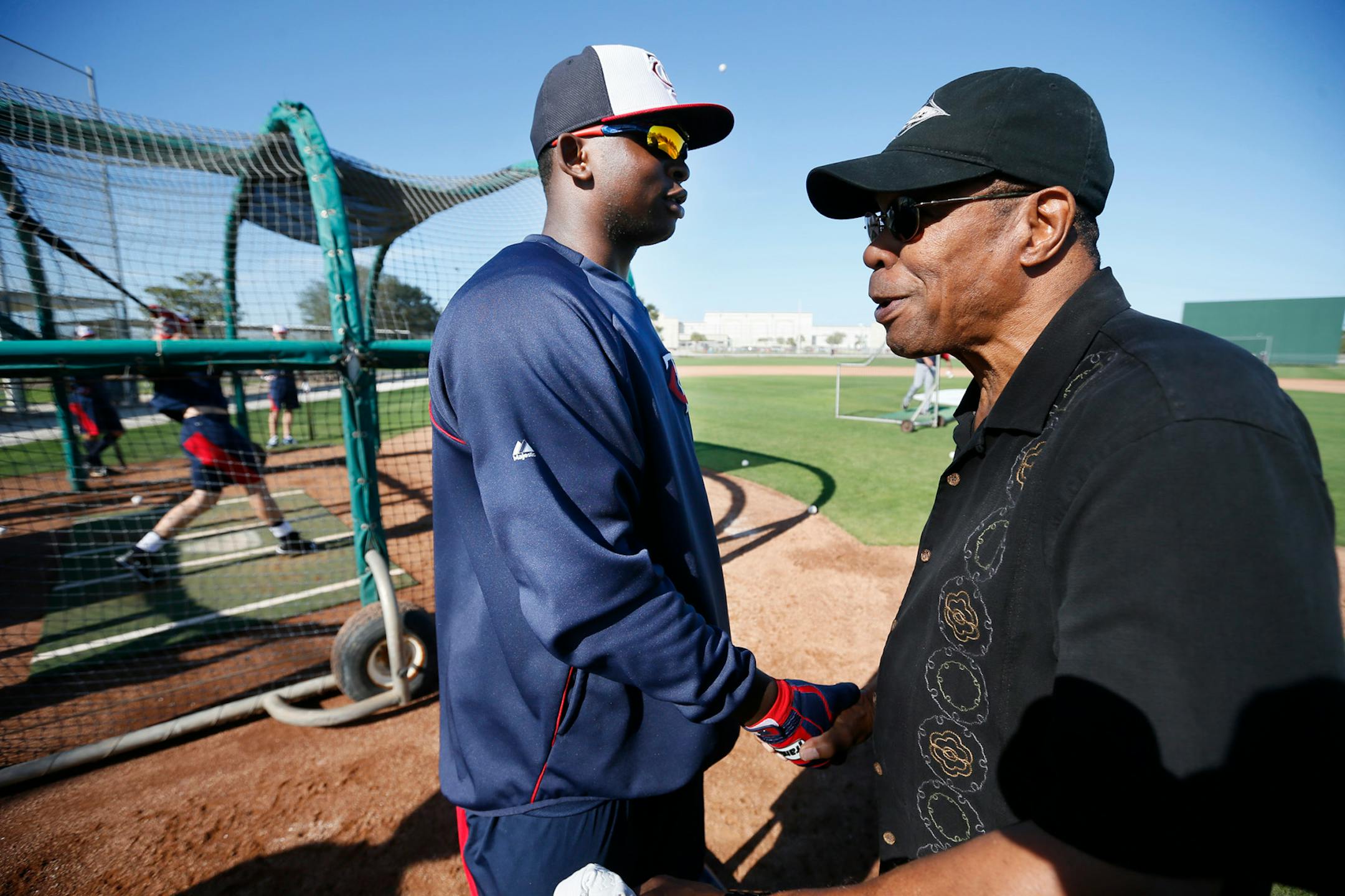Rod Carew shook hands with Sano during spring training in 2014.