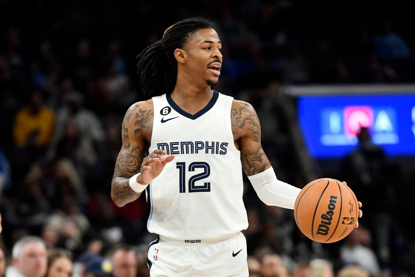 Memphis Grizzlies guard Ja Morant (12) plays in the first half of an NBA basketball game against the Indiana Pacers Sunday, Jan. 29, 2023, in Memphis, Tenn. (AP Photo/Brandon Dill)