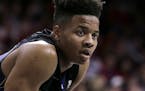 FILE - In this Jan. 29, 2017, file photo, Washington guard Markelle Fultz (20) is shown during the second half of an NCAA college basketball game agai