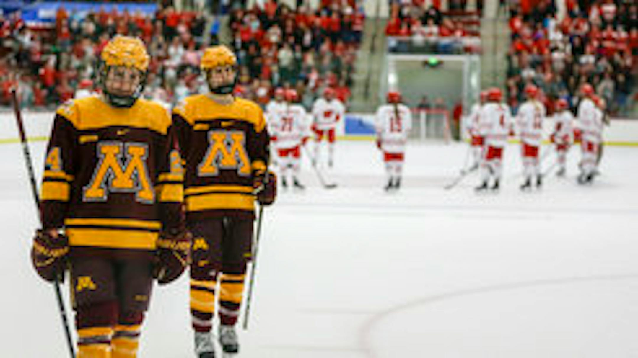 Minnesota's Oliva Knowles (24) skates off the ice after Minnesota lost 4-0 to Wisconsin during the in an NCAA Frozen Four quarterfinal March 10, 2018, in Madison, Wis.