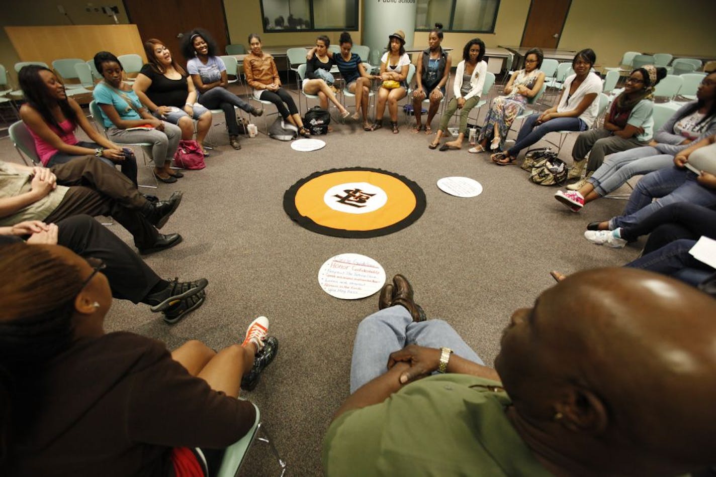 A group of junior and senior girls at St. Louis Park High, led by former Viking Oscar Reed, met last week in a circle to discuss their year-end thoughts.