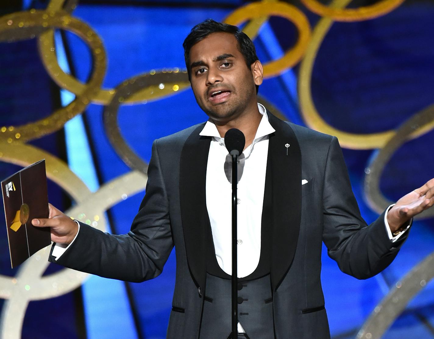 Aziz Ansari presents the award for outstanding writing for a variety series at the 68th Primetime Emmy Awards on Sunday, Sept. 18, 2016, at the Microsoft Theater in Los Angeles. (Photo by Vince Bucci/Invision for the Television Academy/AP Images) ORG XMIT: INVL