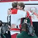 Minnesota Wild center Eric Staal (12) hugged his brother, Carolina Hurricanes center Jordan Staal (11), after a ceremony dedicated to Eric Staal in ho