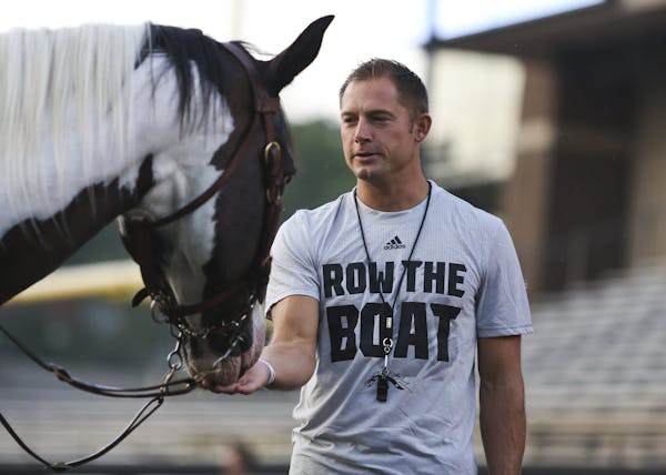 P.J. Fleck turned "Row the Boat" into a common phrase while winning games at Western Michigan University. (2015 photo by Crystal Vander Weit of Kalama