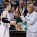 Minnesota Lynx guard Lindsay Whalen talks with coach Cheryl Reeve.