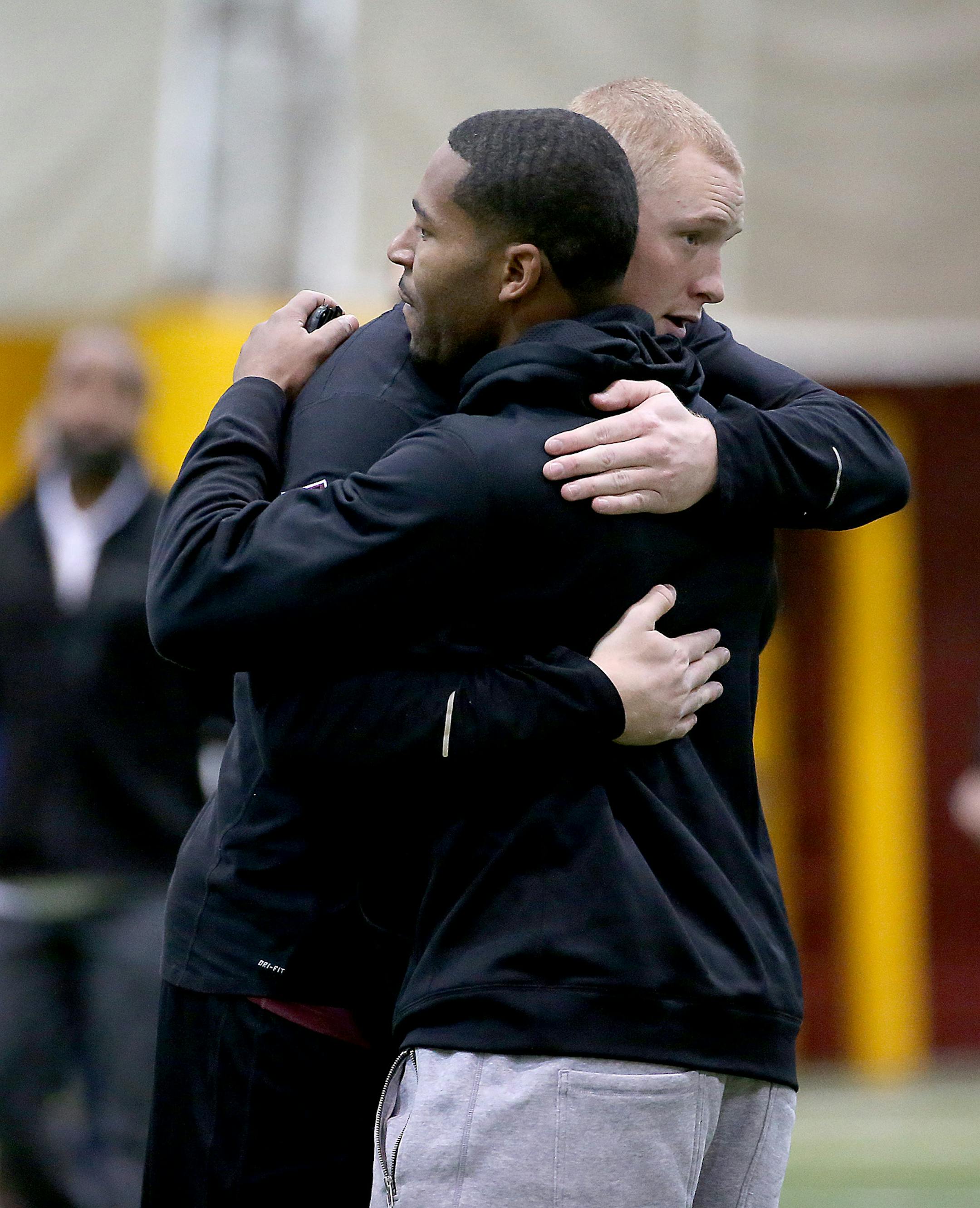 University of Minnesota's Max Williams hugged former teammate David Cobb as Williams performed before NFL scouts during Pro Day at the Nagurski building on campus, Monday, March 2, 2015. ] (ELIZABETH FLORES/STAR TRIBUNE) ELIZABETH FLORES � eflores@startribune.com