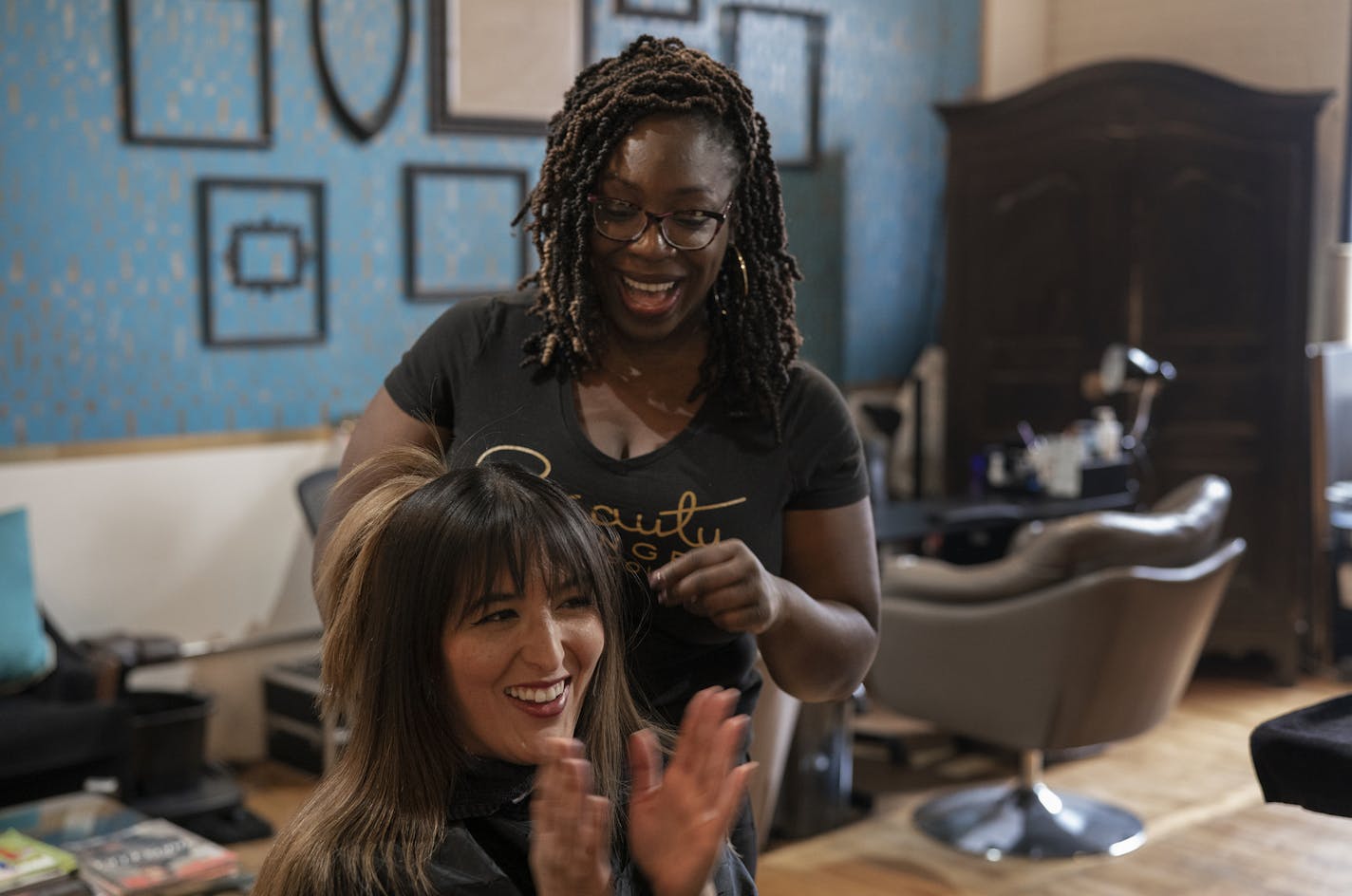 Owner and stylist Melissa Taylor added color to Natalie Deeble's hair at the Beauty Lounge in northeast Minneapolis.