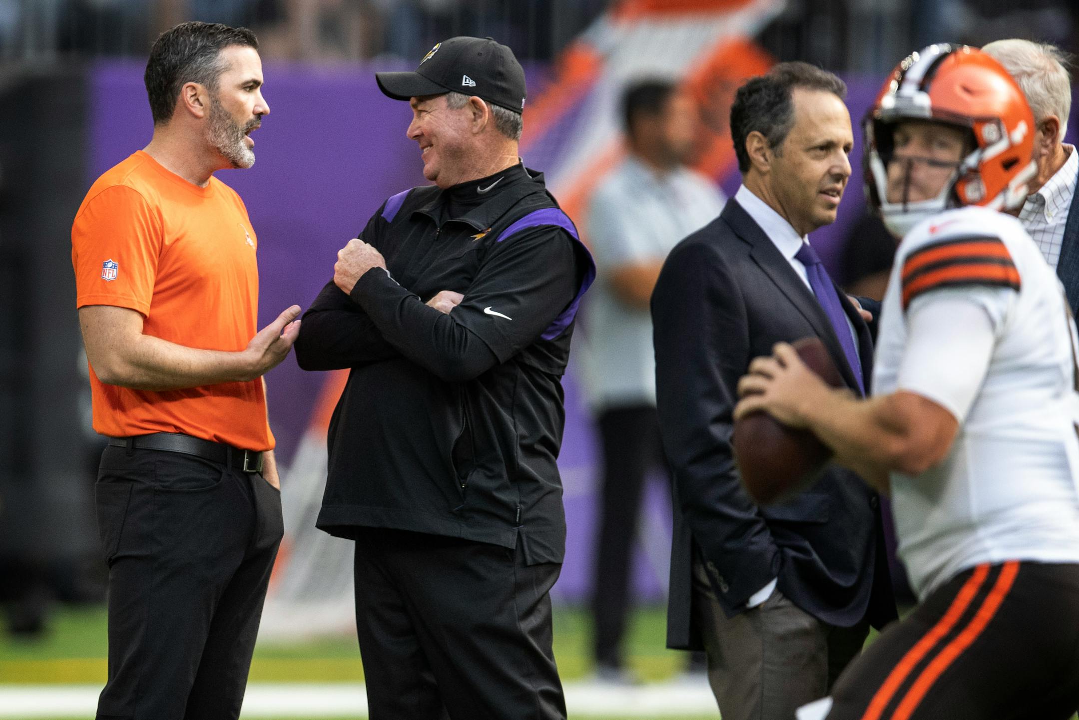 Cleveland Browns head coach Kevin Stefanski left talked with Minnesota Vikings head coach Mike Zimmer during pregame.