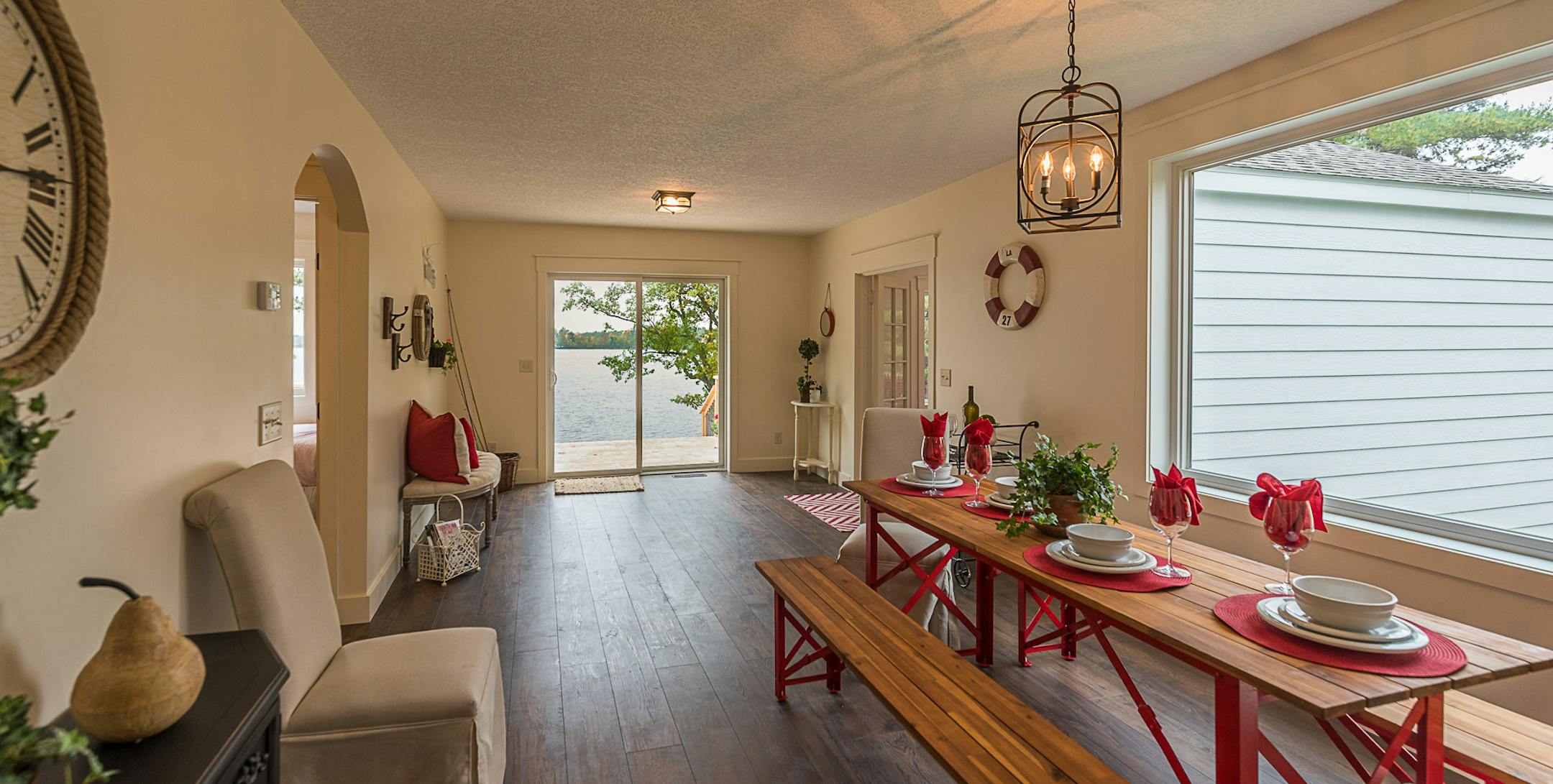 AFTER: Durable floors, big windows and cheerful colors transformed the lake cabin.