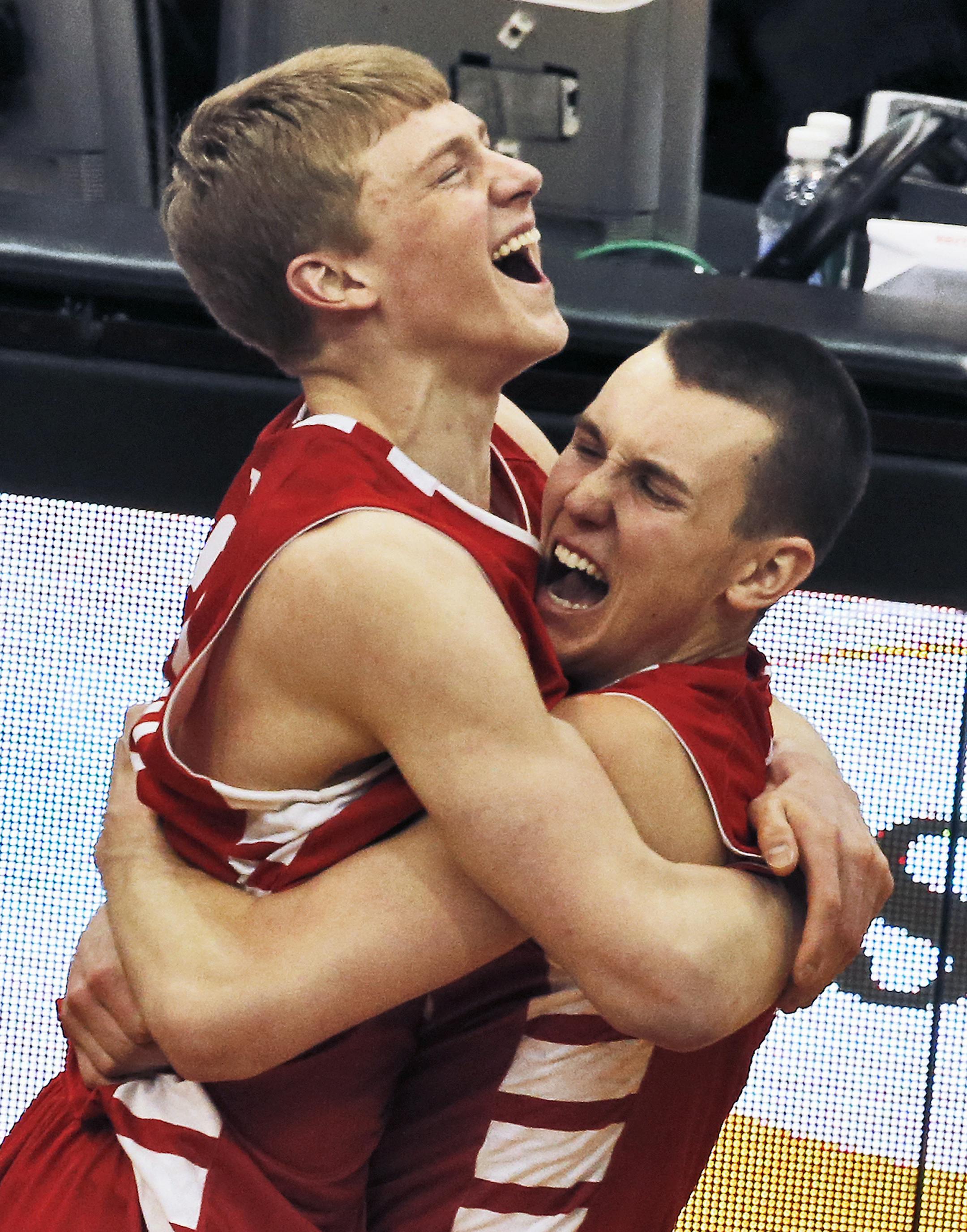 Panthers J.P. Macura, left, and Alex Reiland celebrate the victory at the final horn. ] Class 4A Boys State Basketball Tournament - Hopkins Royals vs. Lakeville North Panthers Lakeville North won. (MARLIN LEVISON/STARTRIBUNE(mlevison@startribune.com)