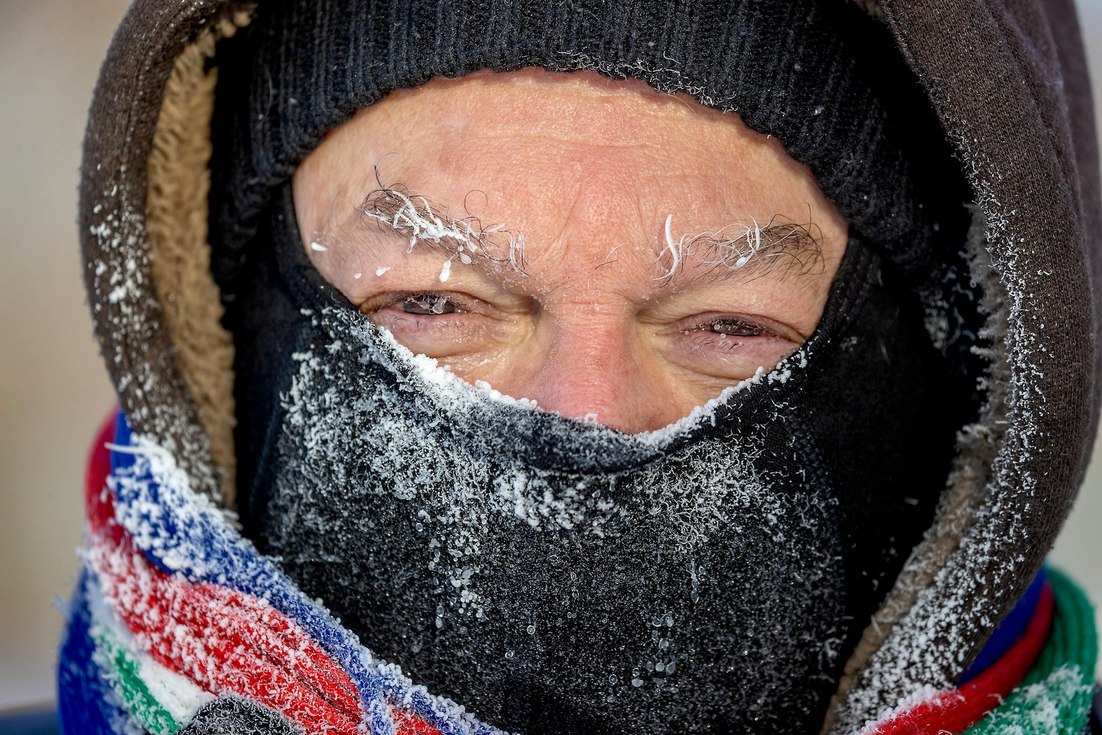 The -16 degree temperatures didn't scare Michael Corman from taking a drive from Maplewood to Minneapolis for a stroll around Lake Nokomis, Monday, February 15, 2021. "I love Minneapolis lakes," he said.
