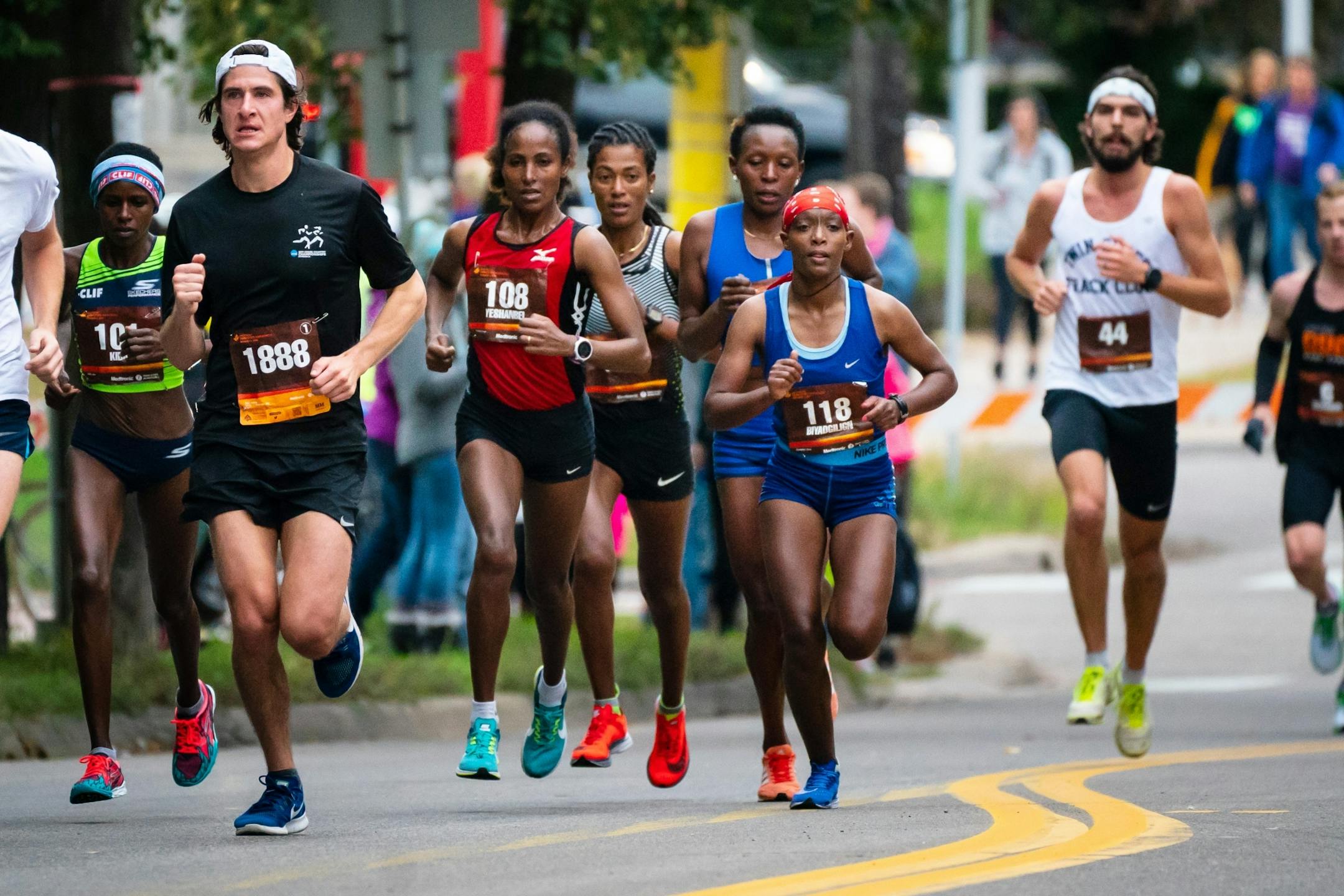 The first group of elite female runners came through Cedar Ave near mile 11, at 9:03 a.m. 118 Since Biyadgilgn, right was the winner, behind her from let are Jane Kibii, Simeon Abnet Yeshanbel, Serkalem Abrha and Sarah Kiptoo during the Twin Cities Marathon.