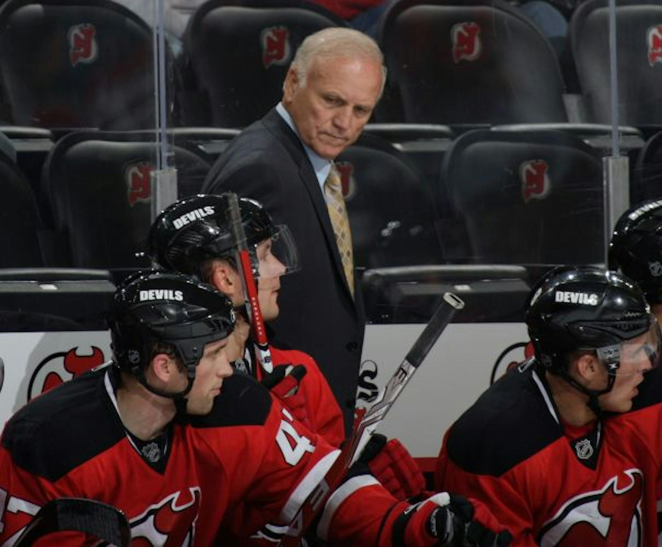 Coach Jacques Lemaire returned for a second stint leading the New Jersey Devils after his nine years with the Wild, his team's opponent on Saturday.
