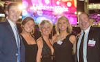 Phil Beaver, Emily, Lisa, Abby and Dan Miller attend the HCMC Light Up the Night Gala at US Bank Stadium.
