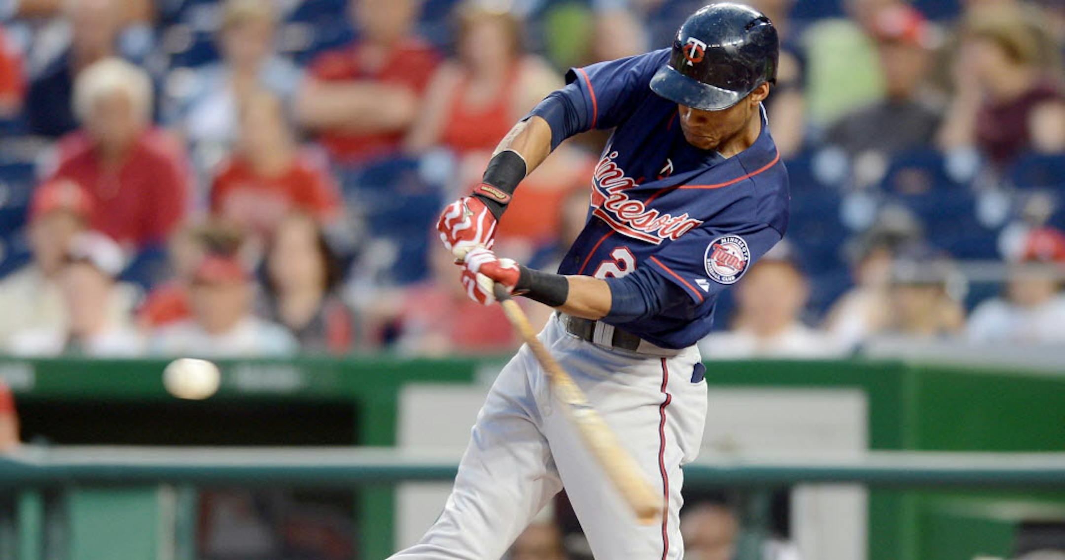 Minnesota's Pedro Florimon hits a 2-run home run in the third inning of Sunday's second game of a day-night doubleheader.