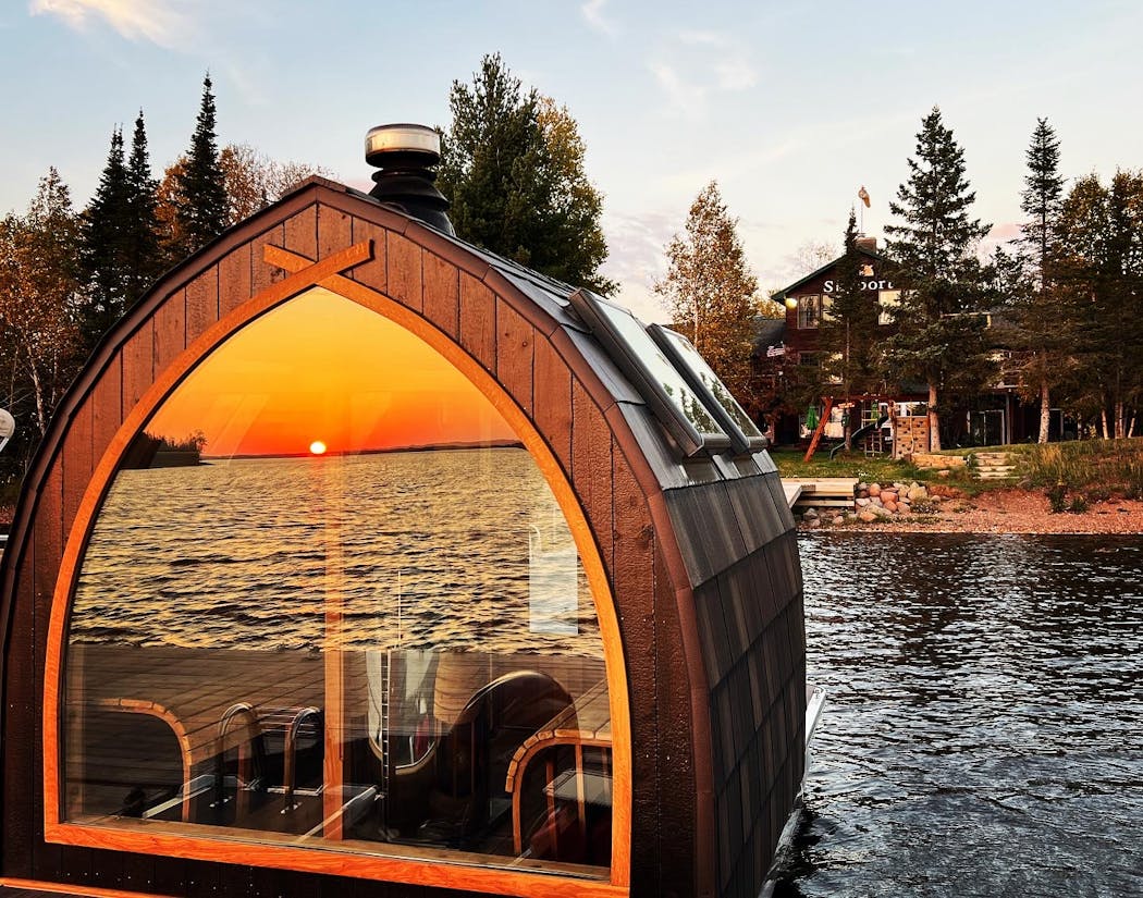 Sisu + Löyly's floating sauna for six people is docked at Skyport Lodge, on Devil Track Lake near Grand Marais.
