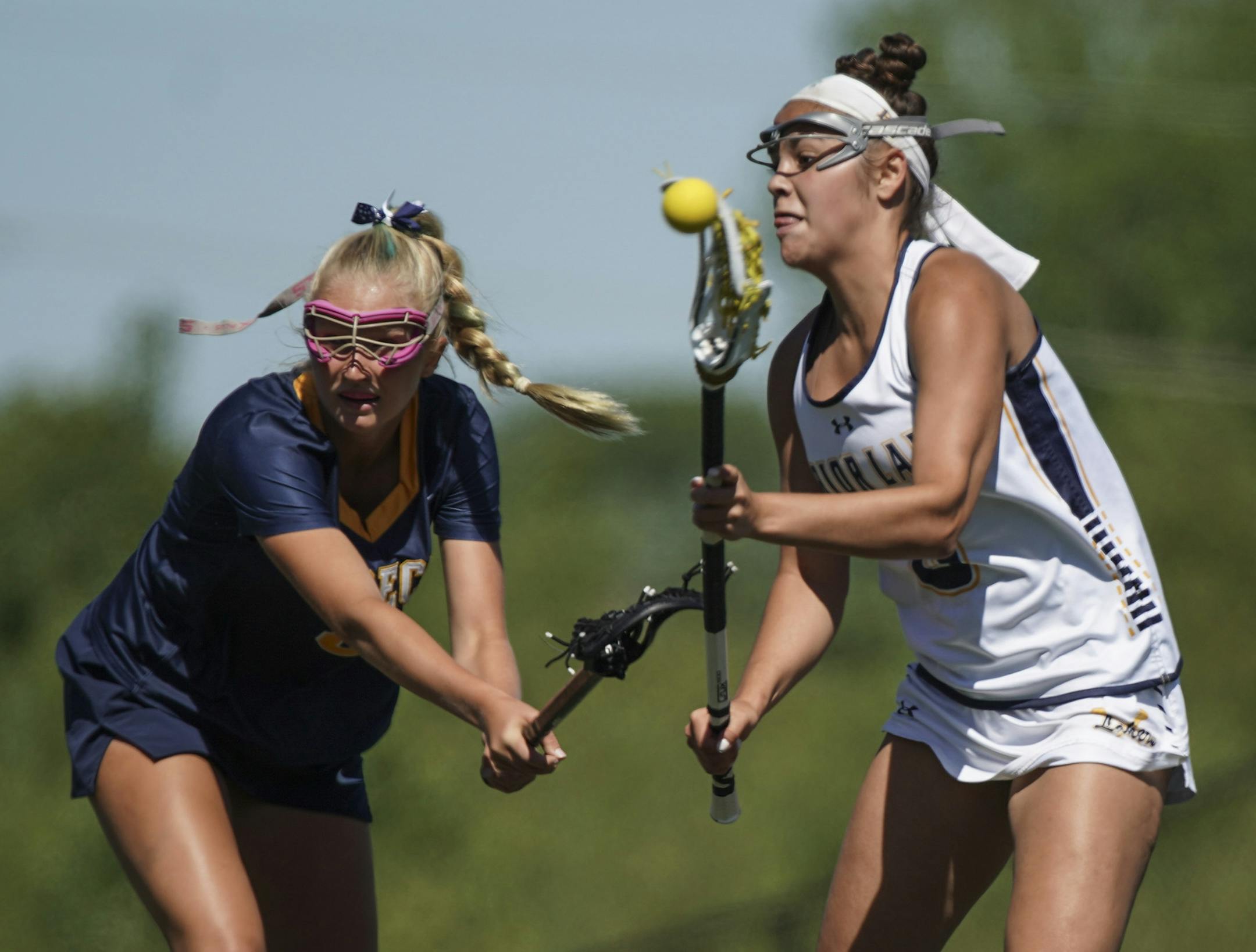 Prior Lake High School's Josie Kropp (8) took a shot as Breck School's Alex Kozikowski (8) tried to stop her scoring during the second half of the Girls Lacrosse State Tournament Semifinals at Chanhassan High School in Chanhassen, Minn., on Thursday, June 13, 2019. ] RENEE JONES SCHNEIDER ¥ renee.jones@startribune.com Prior Lake verses Breck
