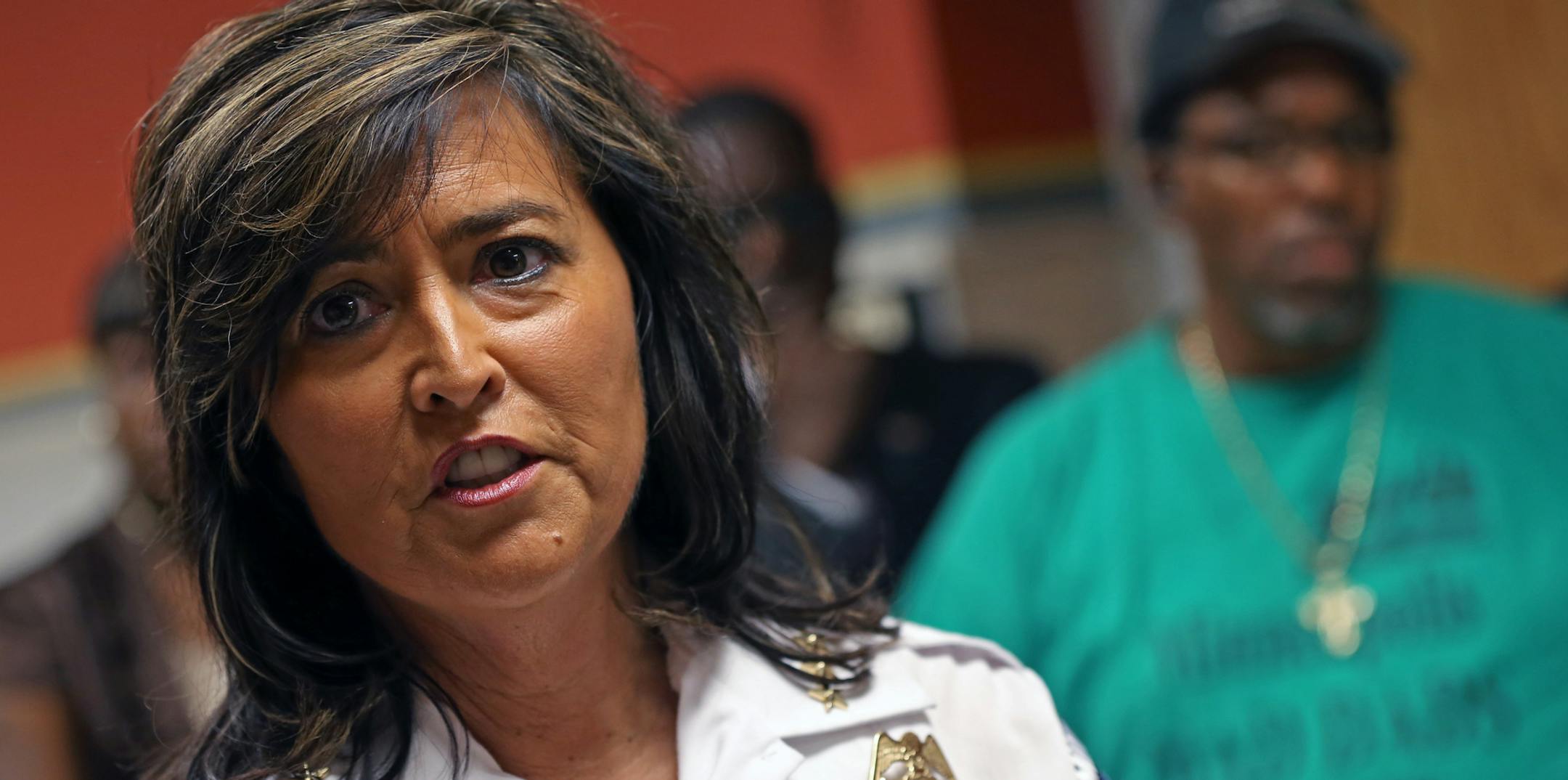 (left) Minneapolis Police Chief Janee Harteau talked to the media after she held a closed door meeting with community leaders on how to improve community relations with the police deptment. This is in response to recent incidents in Green Bay involving Minneapoils cops. The meeting was held at Harteau's office in city hall on 8/7/13.] Bruce Bisping/Star Tribune bbisping@startribune.com Janee Harteau/source.