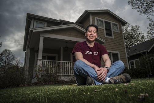 Larry Lee said he's used to people slowing down as they drive by his house in southwest Minneapolis. Passers-by even reach out and touch his lawn, intrigued by its year-round perfection.