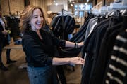 Allison Kaplan peruses the racks at Requisite boutique for her startup, Mother Of, a website that curates mother-of-the-bride fashions.