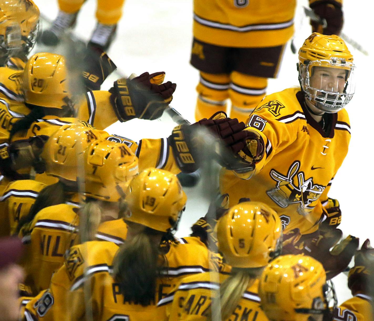 Minnesota&#xed;s Sarah Potomak celebrated her second period goal with teammates on the bench.] JIM GEHRZ &#xef; james.gehrz@startribune.com / Minneapolis, MN / March 12, 2016 / 4:00 PM &#xf1; BACKGROUND INFORMATION: Women's hockey playoffs, Gophers vs. Princeton in NCAA tournament quarterfinals at Ridder Arena, 4 pm.