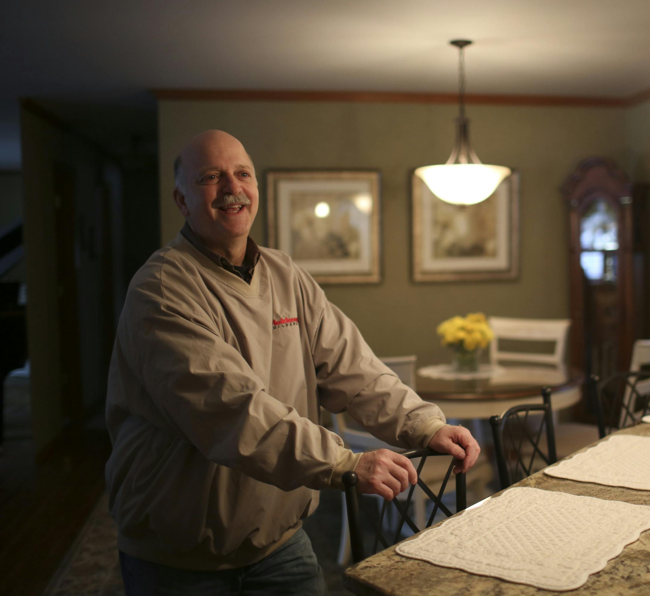 Pat and Gene Swiridow's 1970s rambler remodel and addition will be open for tours on the 2013 Remodelers Showcase, March 22-24. Their kitchen and hearth room addition were photographed Monday afternoon, March 11, 2013 in Eagan, Minn. Dan Hayes of Plekkenpol Builders, Inc., who was the project manager for the Swiridow's remodel, stood at the "peninsula" informal dining area just off the new kitchen. ] JEFF WHEELER ‚Ä¢ jeff.wheeler@startribune.com