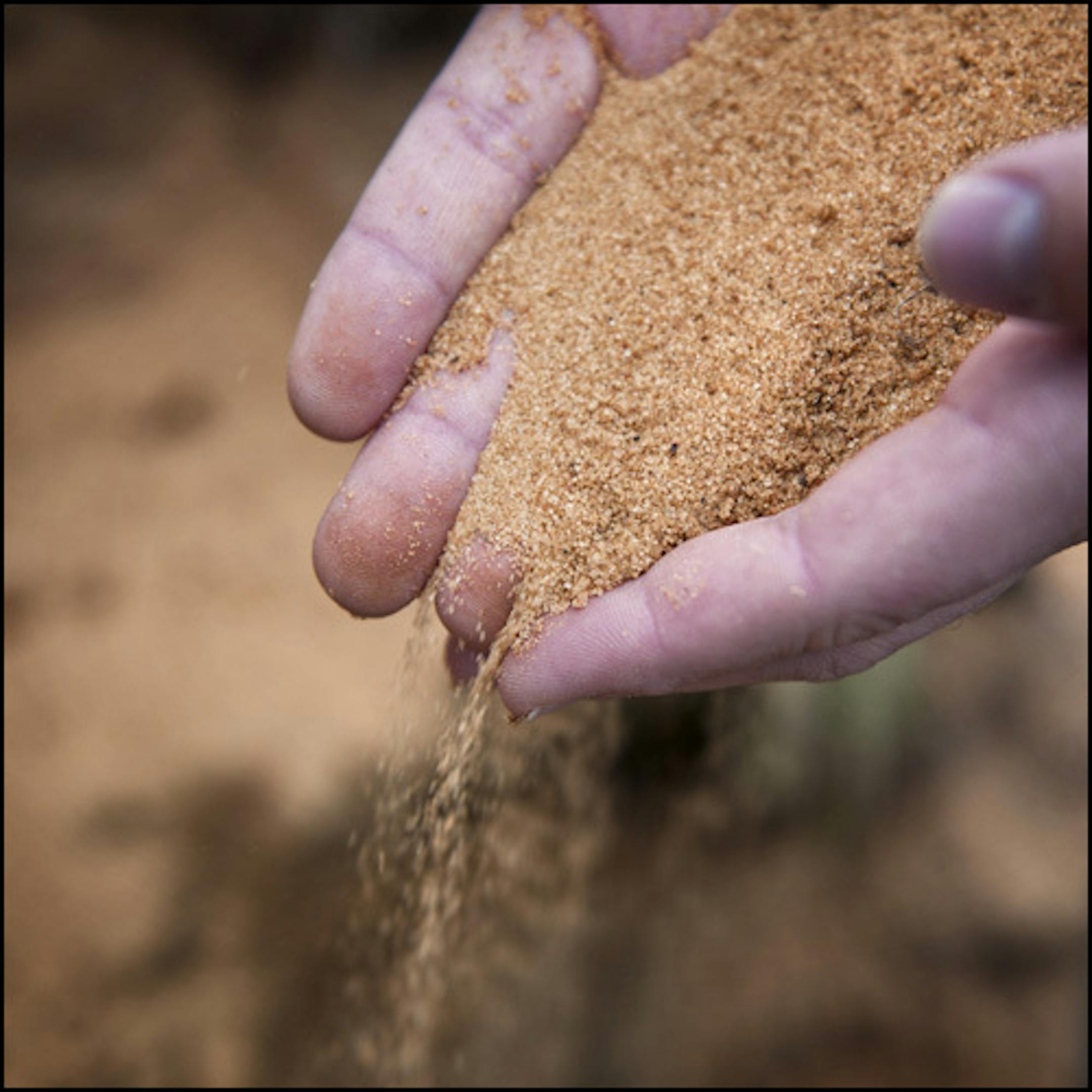 Kyle showed an outcropping of sand that is so valuable to the mining companies. Kyle Slaby signed a lucrative contract with a local frac sand company in the desperate hope that he could save his parents' Arcadia, Wisconsin farm from foreclosure. He never anticipated that a member of his local township board would torpedo the plan - then strike his own deal to mine sand with the company. Tuesday, December 18, 2012 ] GLEN STUBBE * gstubbe@startribune.com ORG XMIT: MIN1212191732061768 ORG XMIT: MIN