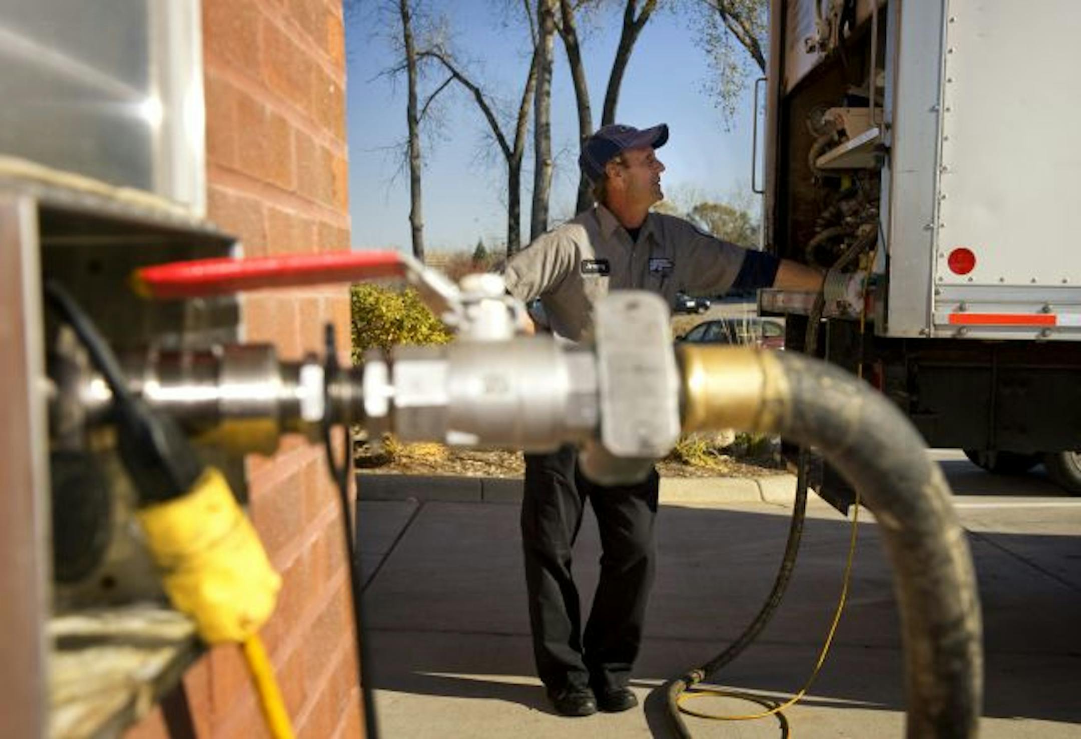 Jimmy Micek of Restaurant Technologies removed waste oil from McDonalds in Eagan and delivered fresh cooking oil.