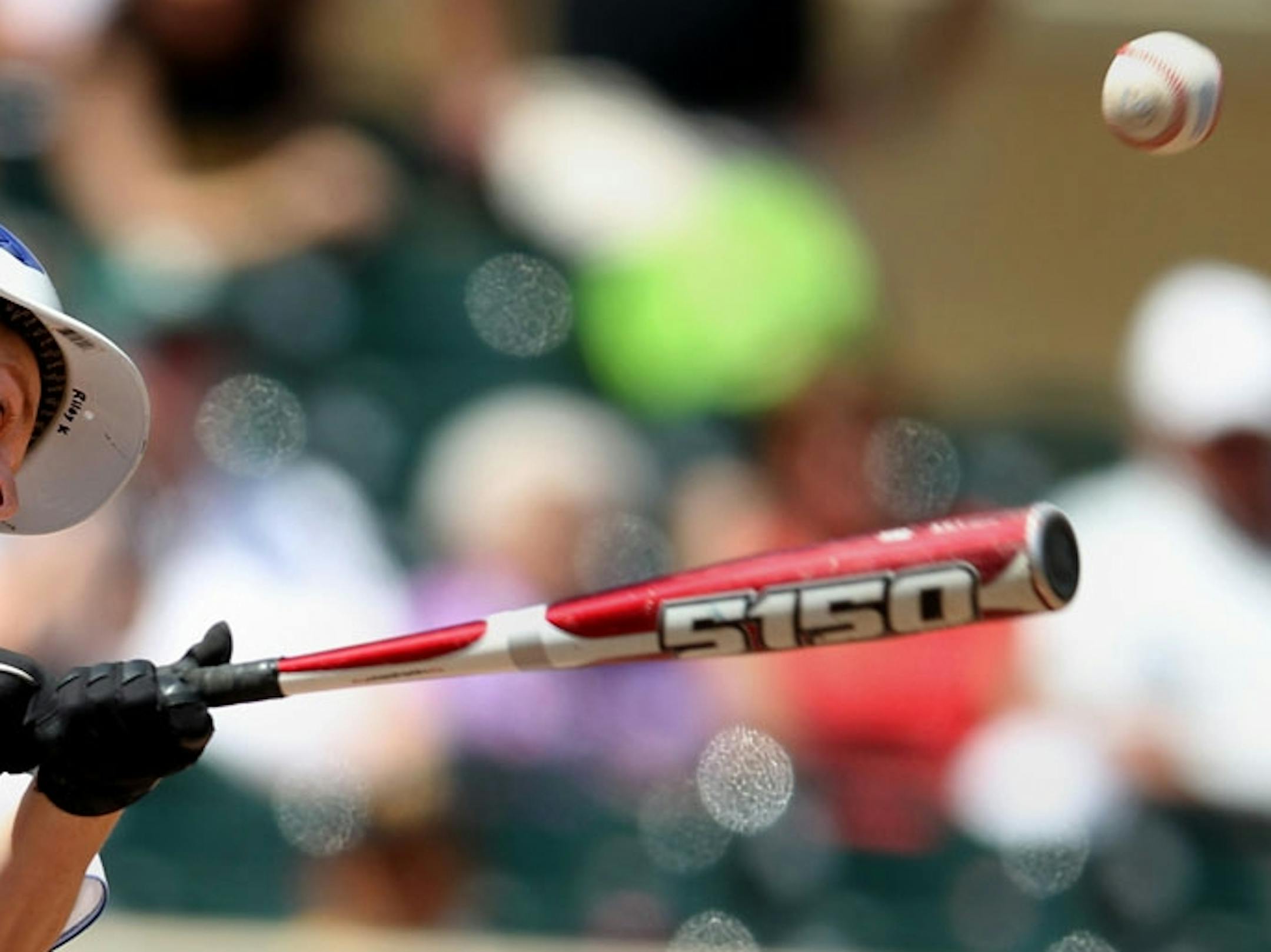 Kasson-Mantorville's Riley Knoepke (2) bats during their class AA boys high school baseball championship game against Perham Class on Monday, June 17, 2013, in Minneapolis.
