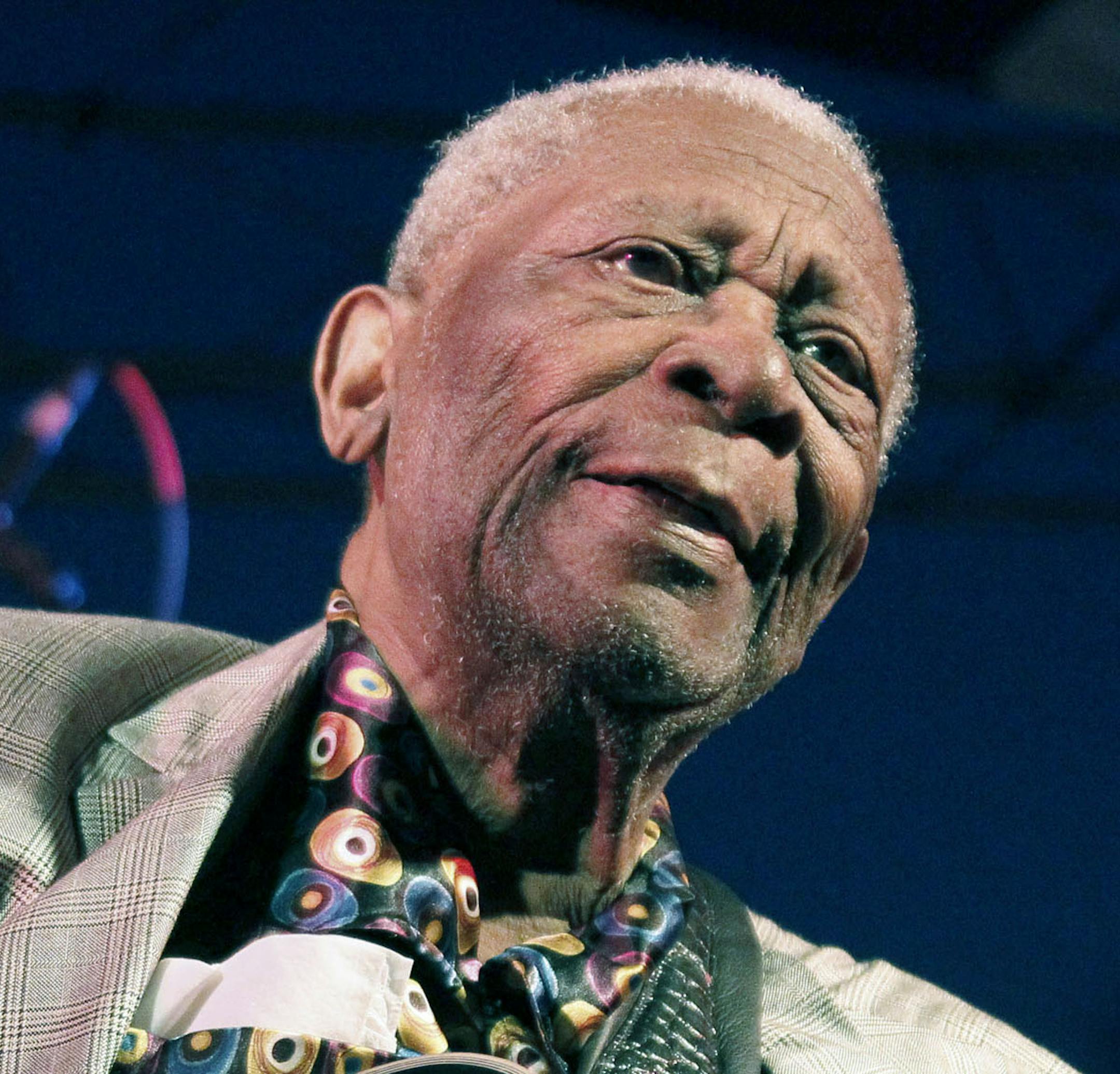 FILE - In this file photo taken Aug. 22, 2012, B.B. King performs at the 32nd annual B.B. King Homecoming, a concert on the grounds of an old cotton gin where he worked as a teenager in Indianola, Miss. The Blues legend King is telling fans he’s in hospice care at home in Las Vegas. The 89-year-old musician posted thanks to fans on his official website Friday, May 1, 2015, for well-wishes and prayers. (AP Photo/Rogelio V. Solis, File)