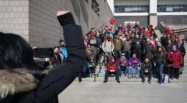Educators posed for a photo at Central High School in St. Paul on March 13 after a strike resolution was passed.