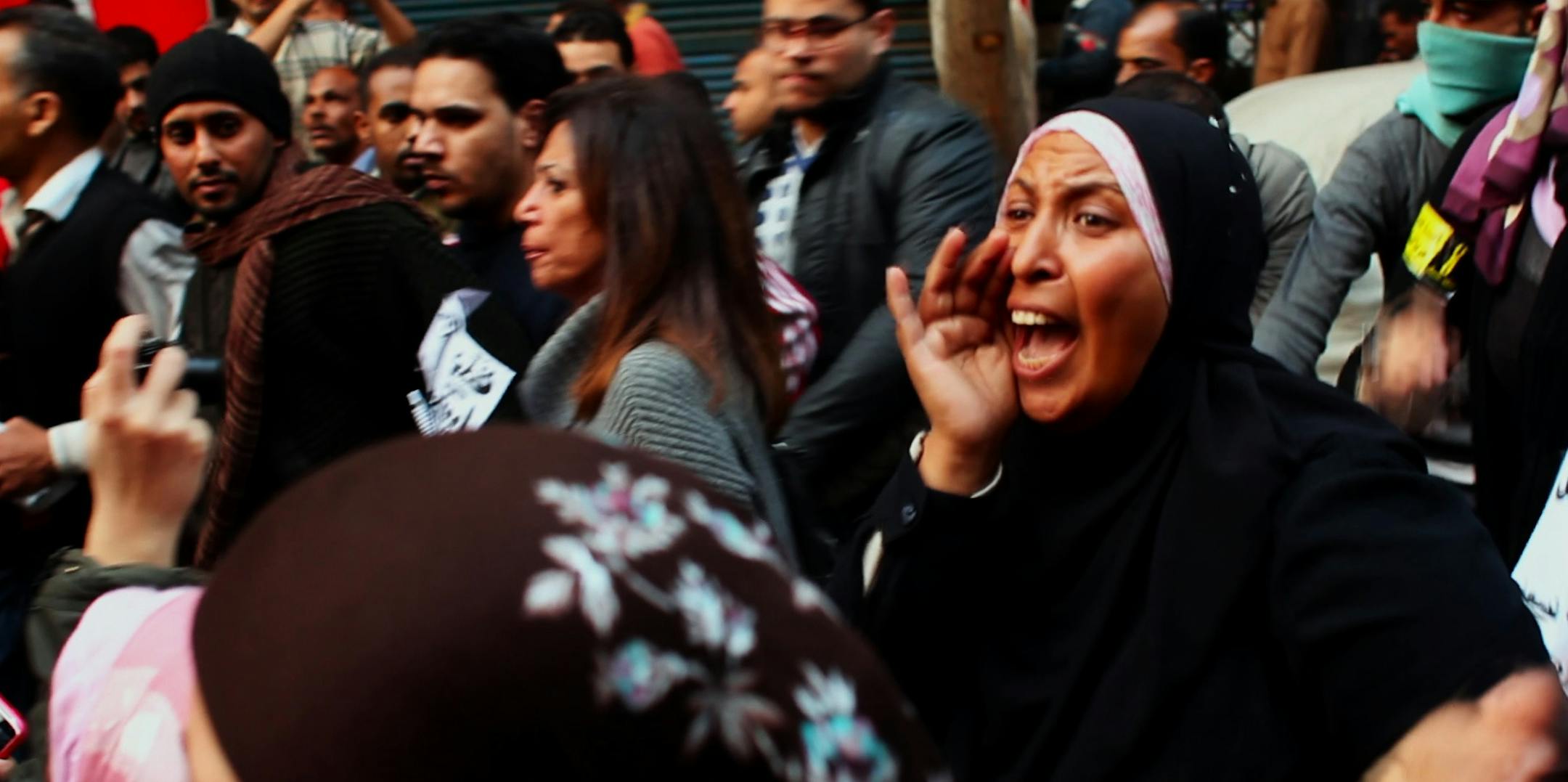 Women chanting in " WOMEN, WAR & PEACE II "The Trials of Spring"
