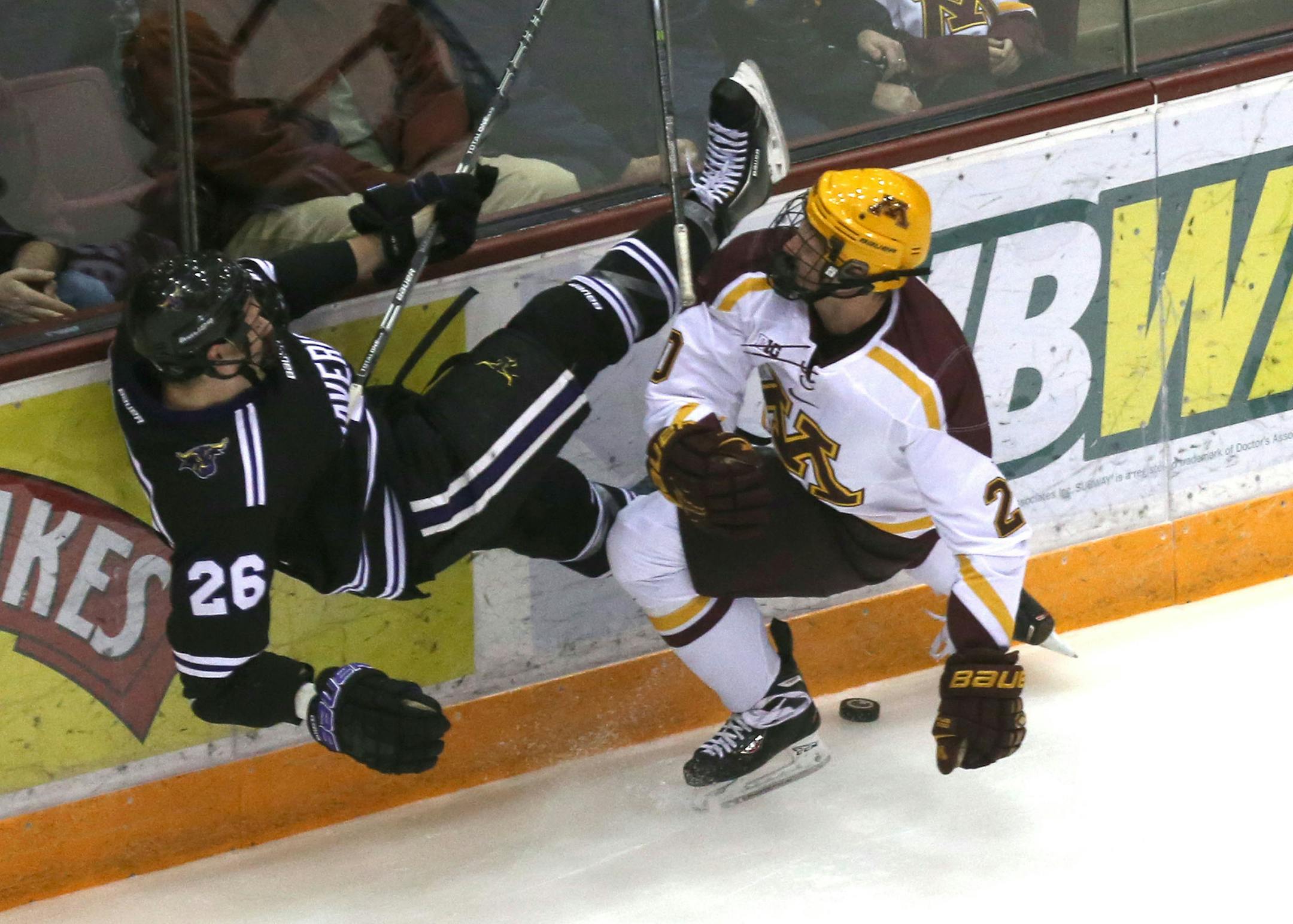 Gopher Michael Brodzinski knocked Minnesota State's Dylan Margonari off the puck during the first period at Mariucci Arena in Minneapolis, Min., Friday, November 15, 2013 ] (KYNDELL HARKNESS/STAR TRIBUNE) kyndell.harkness@startribune.com