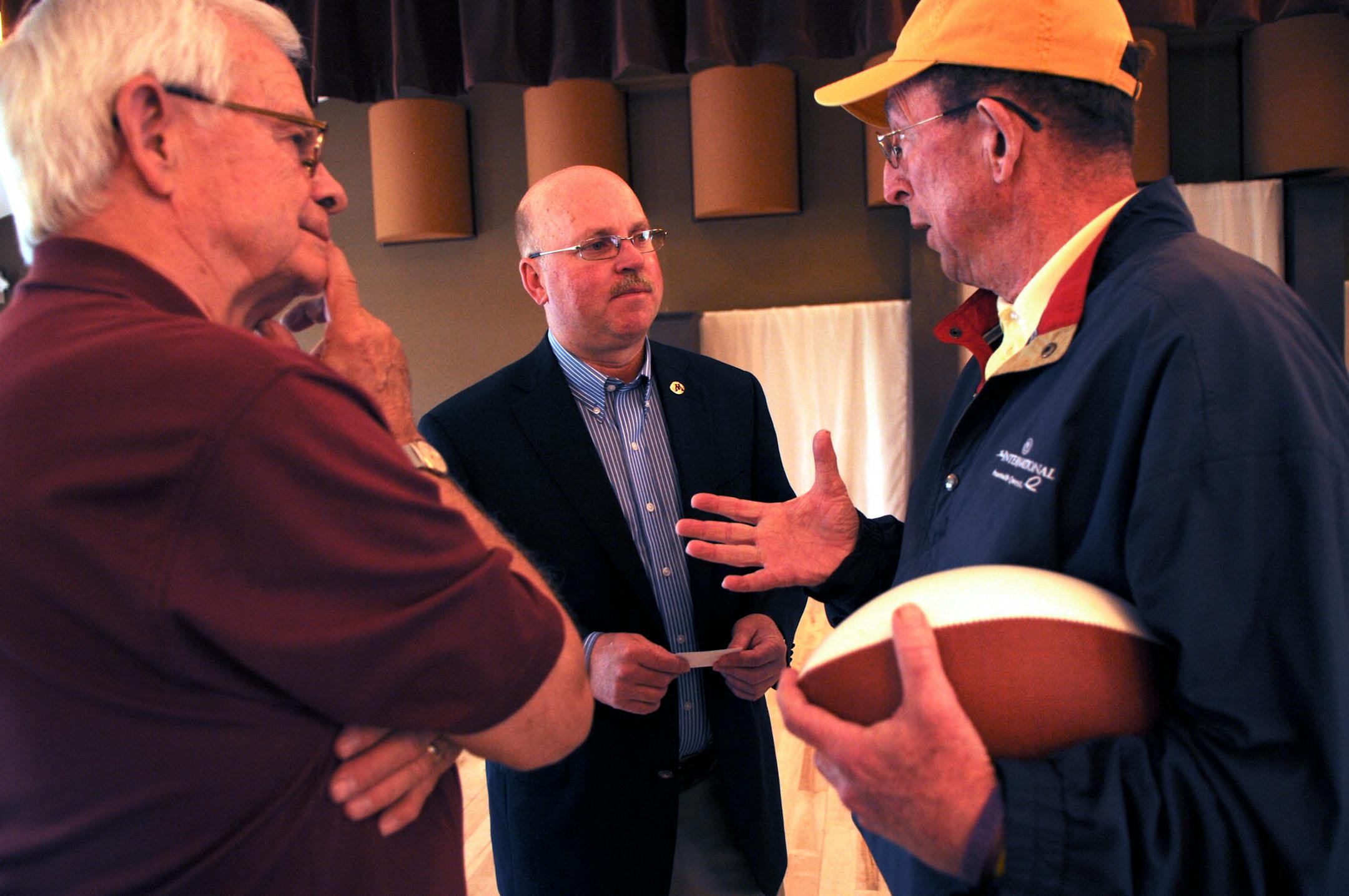 Richard Sennott/Star Tribune. Richard.Sennott@startribune.com Hutchinson Mn. Thursday 05/19/11 ] New Gophers football coach Jerry Kill began his "On the Road with Jerry Kill'' tour today. First-day stop was in Hutchinson at the Crow Wing Golf Club and later in the day in Willmar and Mankato. Jerry Kill in the middle listened to Keith Krommenhoek oif Hutchinson a cancer survivor talk about his struggles with Ron Max of Hutchinson on the left. Coach Kill is now 5 years free of cancer and was offer
