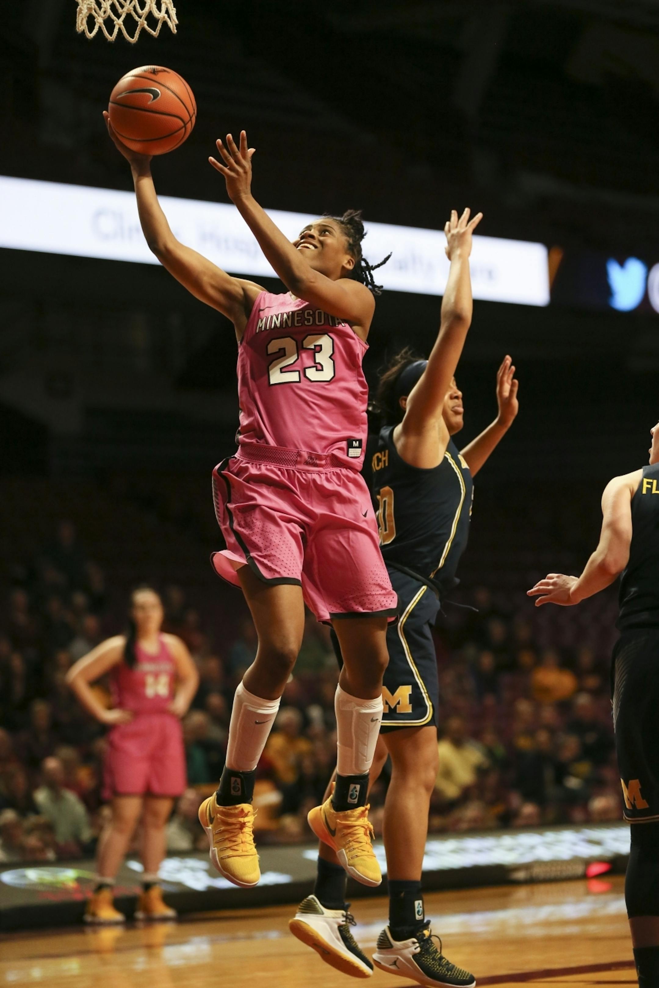 Minnesota Golden Gophers guard Kenisha Bell (23) went for a shot in the second half.