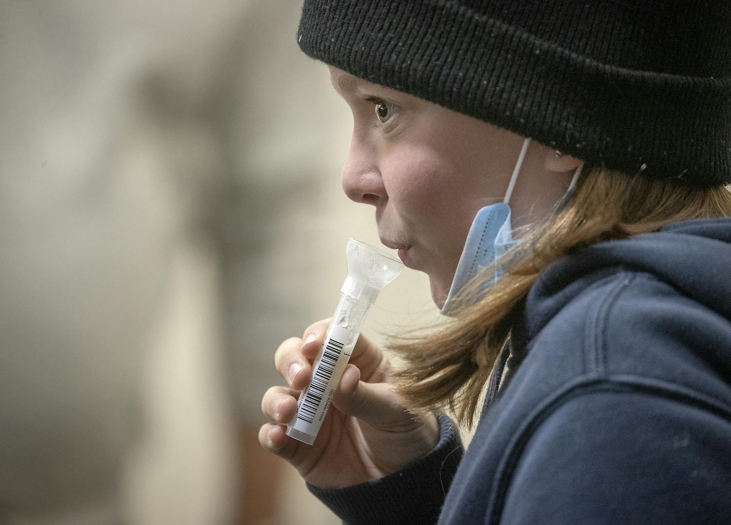 Amelia Smith, 12, took a COVID test at the new saliva COVID-19 testing site at the Minneapolis-St. Paul International Airport, Thursday, November 12, 2020. ] ELIZABETH FLORES • liz.flores@startribune.com