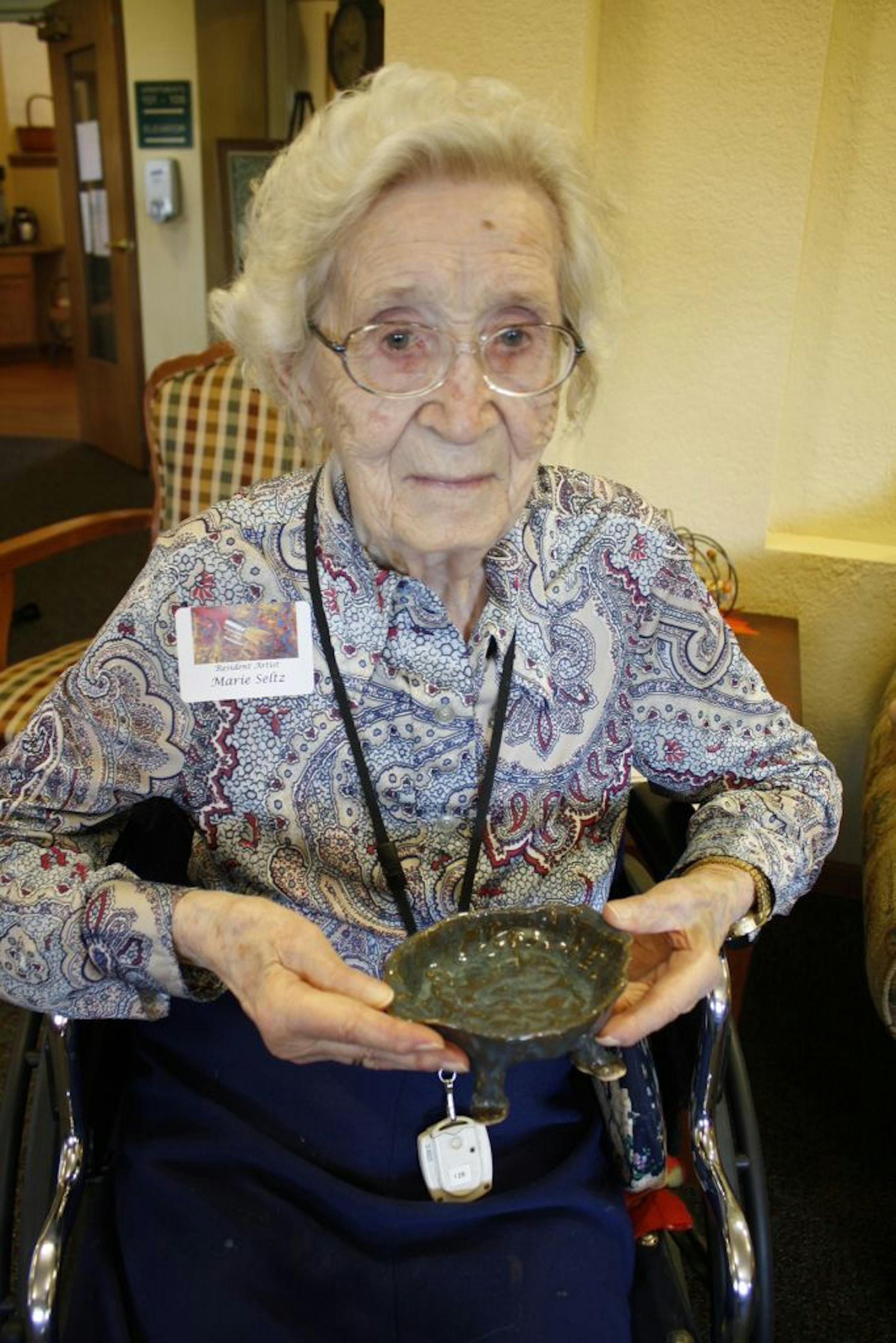 Marie Seltz, 101, created a bowl during an art class at the Lighthouse of Waconia.
