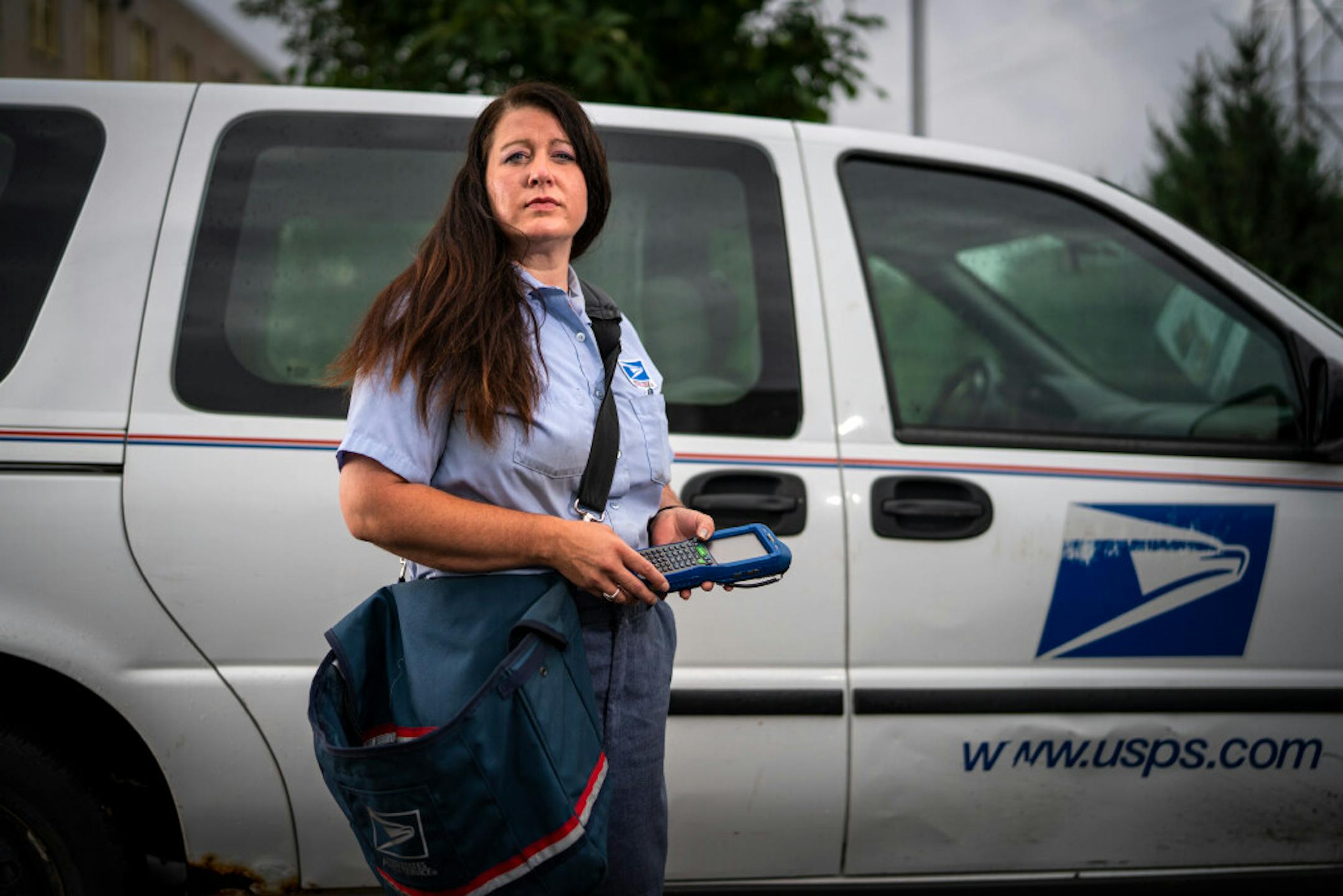 U.S. Postal Service mail carrier Angela Hardy's employer consistently ranks as Americans' favorite government agency.