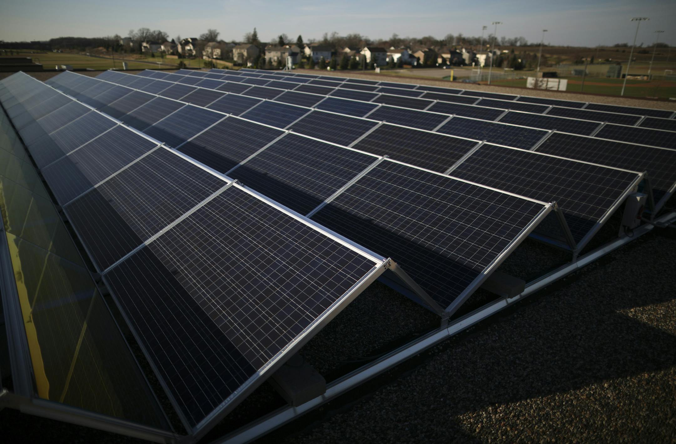 The solar array on the roof of Waconia Senior High School Tuesday afternoon. ] JEFF WHEELER ï jeff.wheeler@startribune.com South metro schools are investing in solar energy in an effort to save money and cash in on energy rebates that expire at the end of 2016. Waconia Senior High has had solar panels its roof for a year and a half. The array was photographed Tuesday afternoon, November 24, 2015.