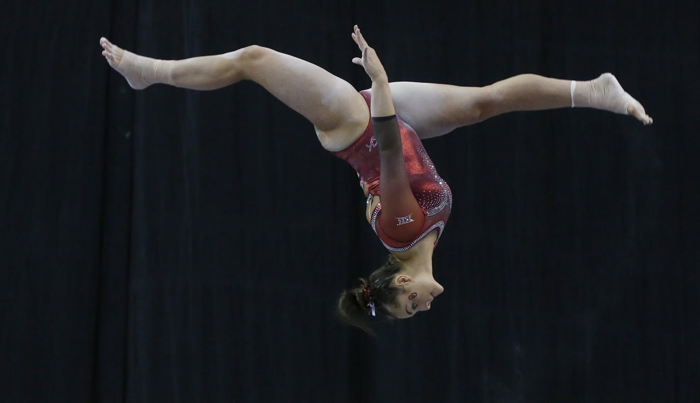 Oklahoma gymnast Maggie Nichols competes in the Perfect Ten Challenge at the Bart and Nadia Experience in Oklahoma City, Saturday, Feb. 16, 2019. (AP Photo/Sue Ogrocki) ORG XMIT: OKSO ORG XMIT: MIN1904171542309618