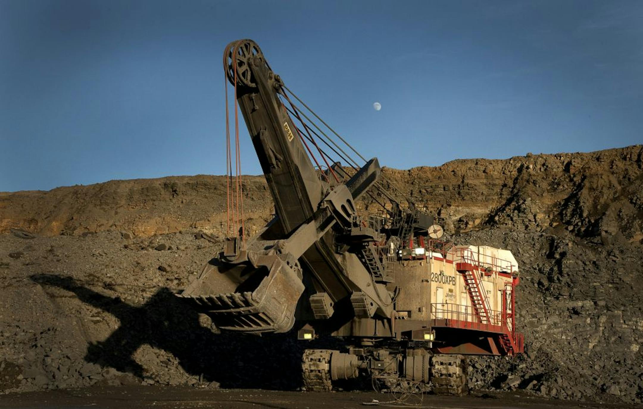 A P&H electric rope shovel works at an open pit mine at the Hibbing Taconite Co. pellet manufacturing plant, operated by Cliff's Natural Resources Inc., in Hibbing, Minn.