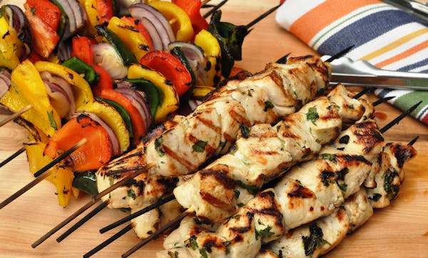 Fire up the grill for Chicken Fajita Kebabs, above, and Pork Chops With Alabama White Barbecue Sauce.