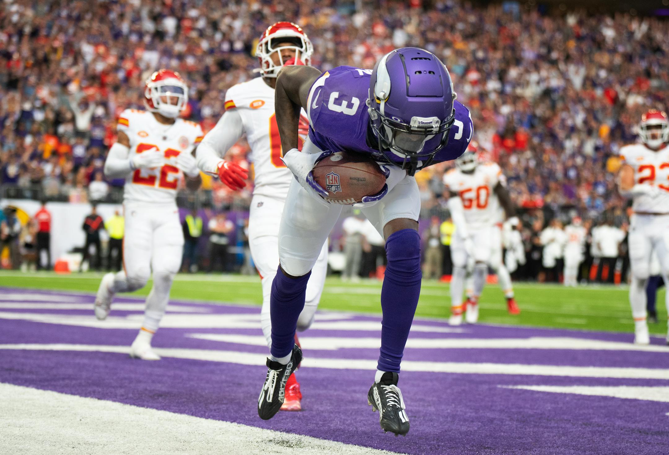 Minnesota Vikings wide receiver Jordan Addison (3) keeps both feet in bound for a second quarter touchdown.
