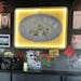 At the new Punk Rock Museum in Las Vegas, the old sign from Minneapolis’ defunct Triple Rock Social Club hangs behind the bar.