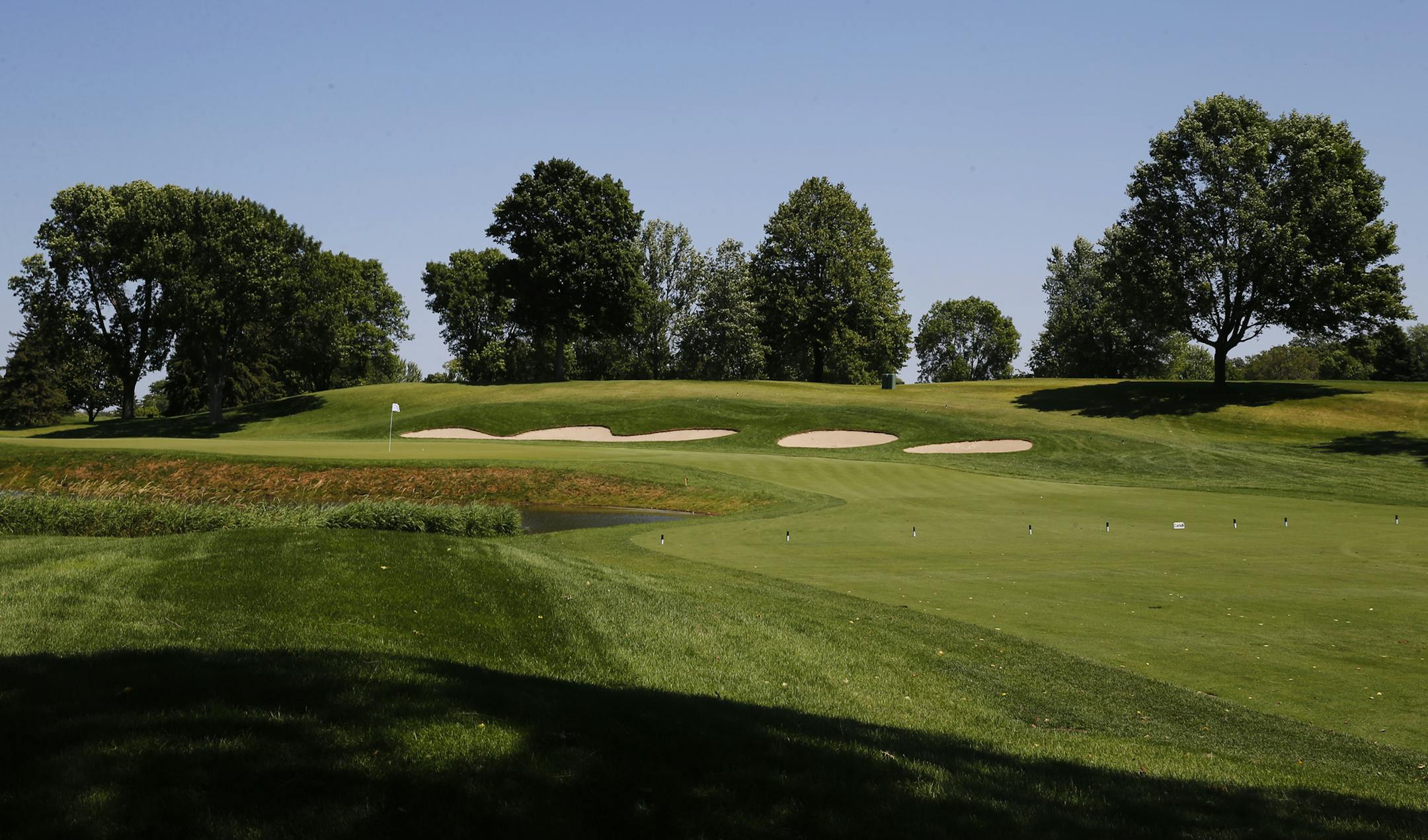The signature 7th hole is one Davis Love will look over carefully . He captains the 2016 Ryder's Cup team. He received an honorary membership to the Hazeltine golf course which will host the event.] Richard Tsong-Taatarii/rtsong-taatarii@startribune.com ORG XMIT: MIN1507191559250699