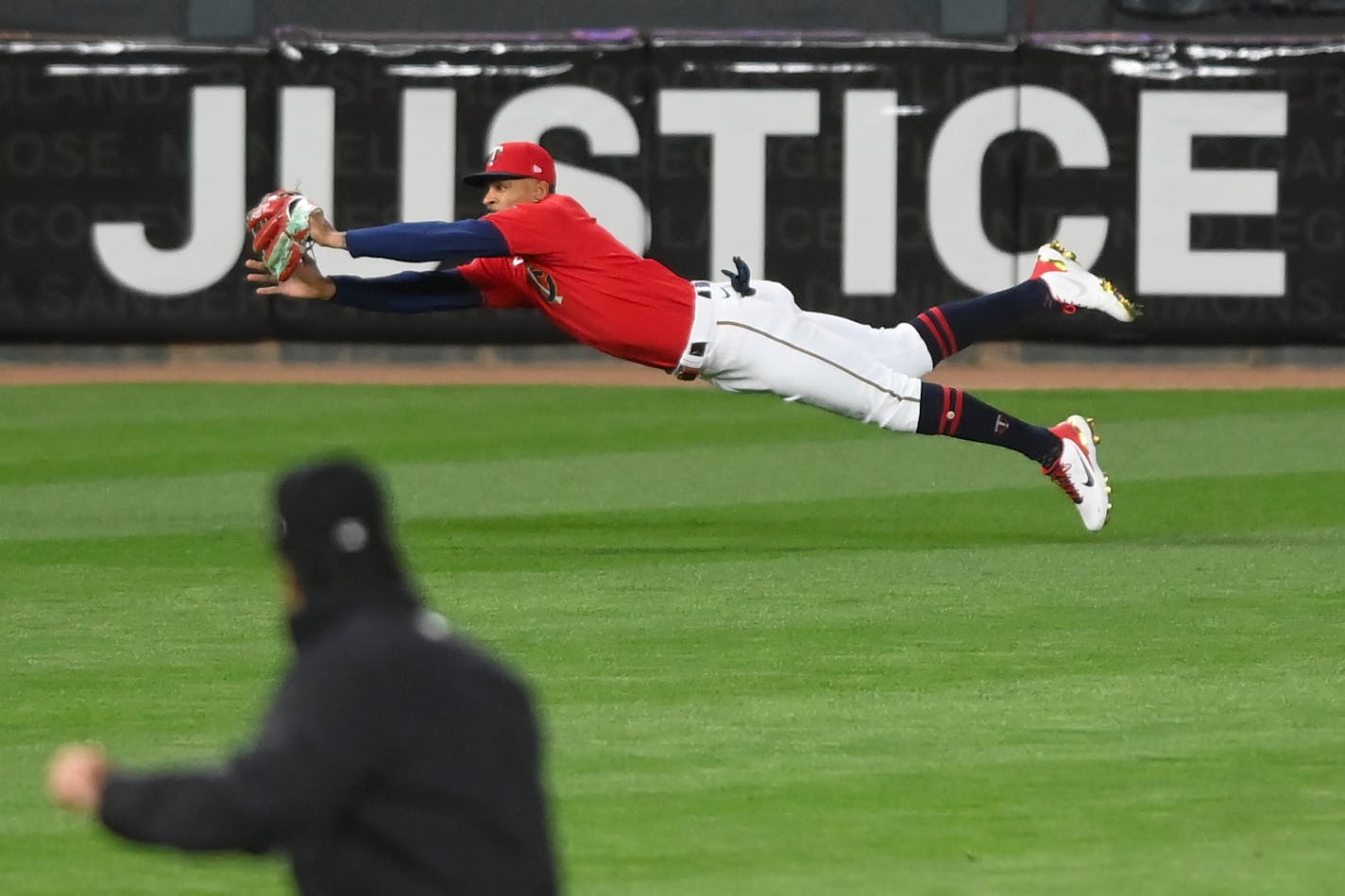 Twins center fielder Byron Buxton made a diving catch on a ball hit by Rangers left fielder David Dahl in the top of the seventh inning.