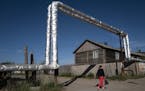 Pipes traditionally are built aboveground in Yakutsk, Russia, because of the hard permafrost. As it thaws, it alters Siberia's landscape as well as th